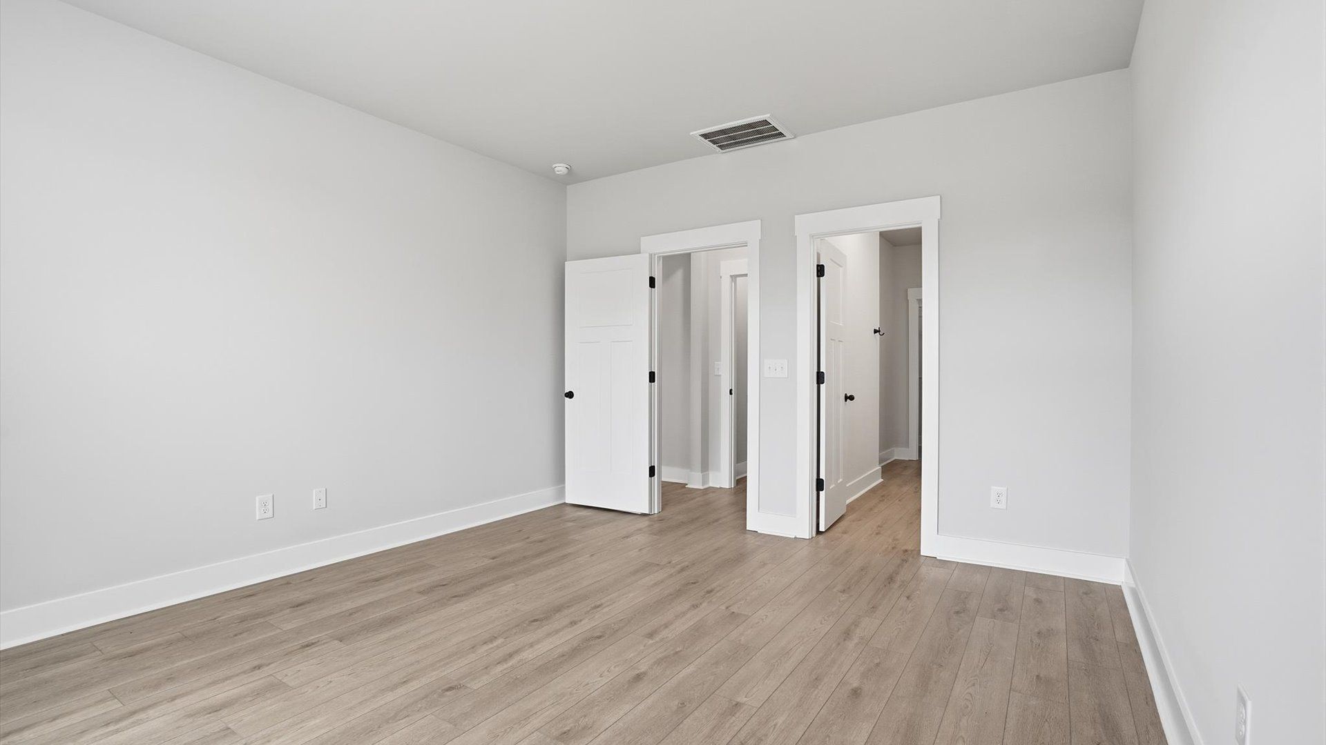 Highly skilled design shines in this elegant, restful primary suite near Downtown Anderson