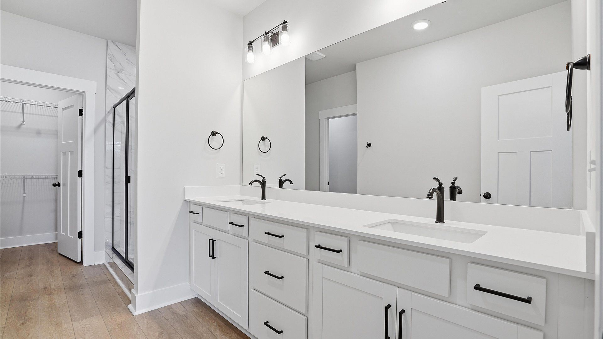 Exceptional en-suite with dual vanity and glass-enclosed walk-in shower for superior everyday comfort at Silo Ridge