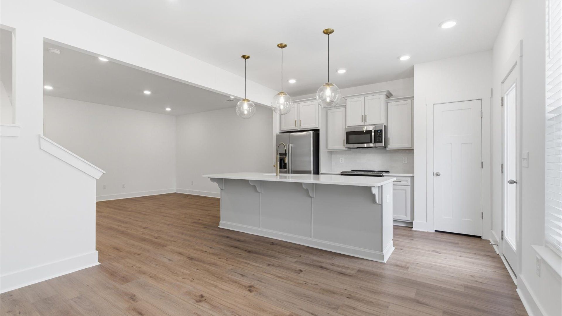 Inviting breakfast area with a seamless connection to the kitchen for everyday living located at Gresham Station
