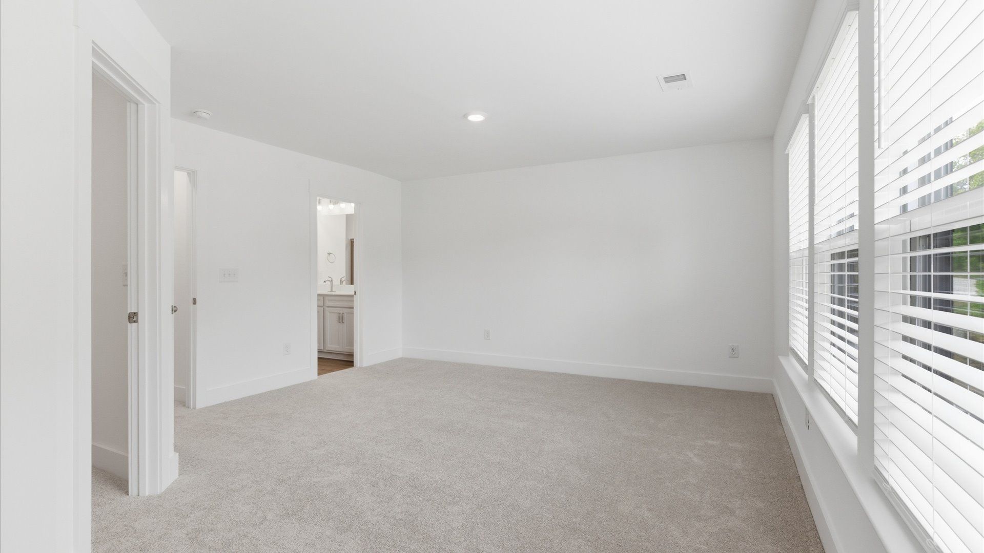 Highly skilled design shines in this elegant, restful primary suite near Downtown Simpsonville