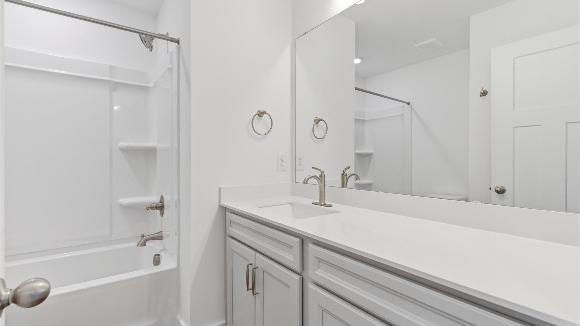 Top-notch bathroom with current fixtures, tasteful materials, and elevated charm near Downtown Simpsonville, SC