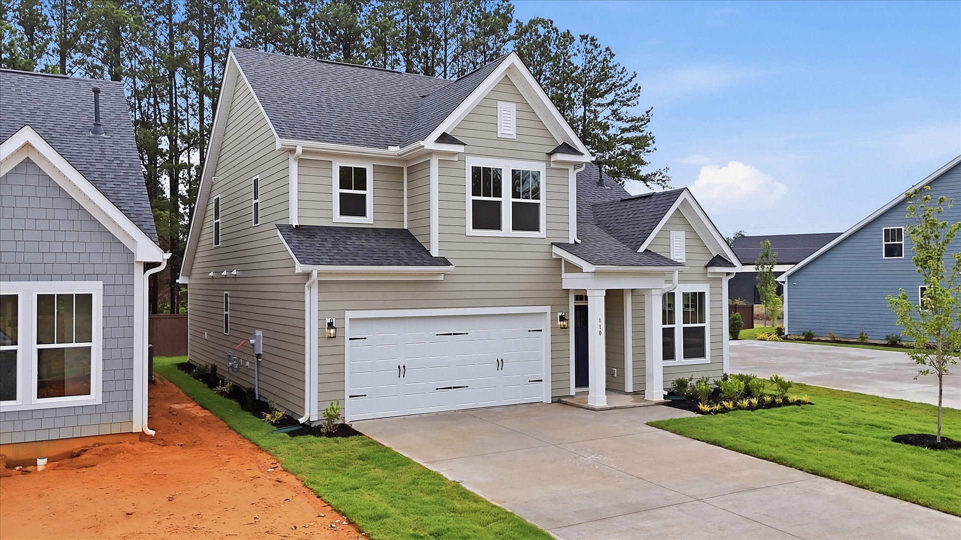 Refined exterior design with balanced architectural detail in this distinguished two-story home at Barton Hollow