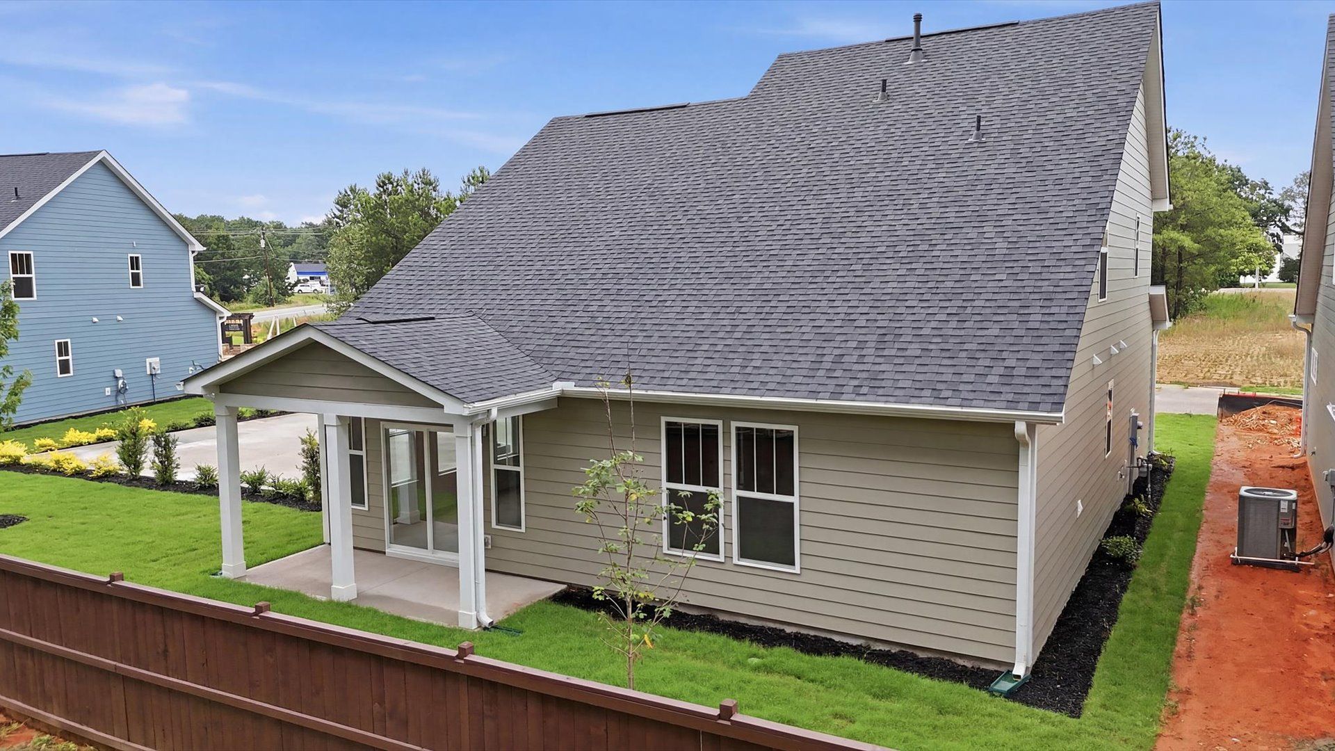 Established charm meets functional outdoor living with a spacious rear covered porch located in Fountain Inn, SC