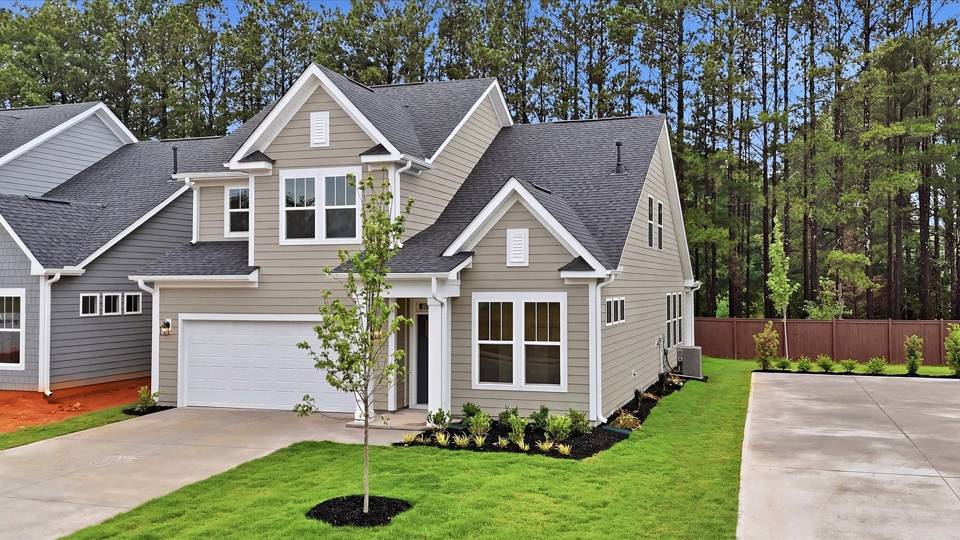 Desirable location and established charm in this superior two-story home community near Downtown Fountain Inn