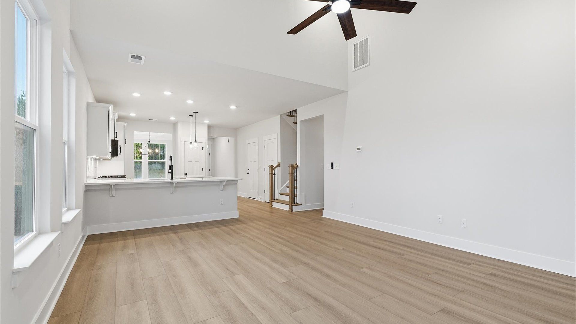 Spacious and stylish family room with high ceilings that create a bright and open atmosphere in Fountain Inn, SC