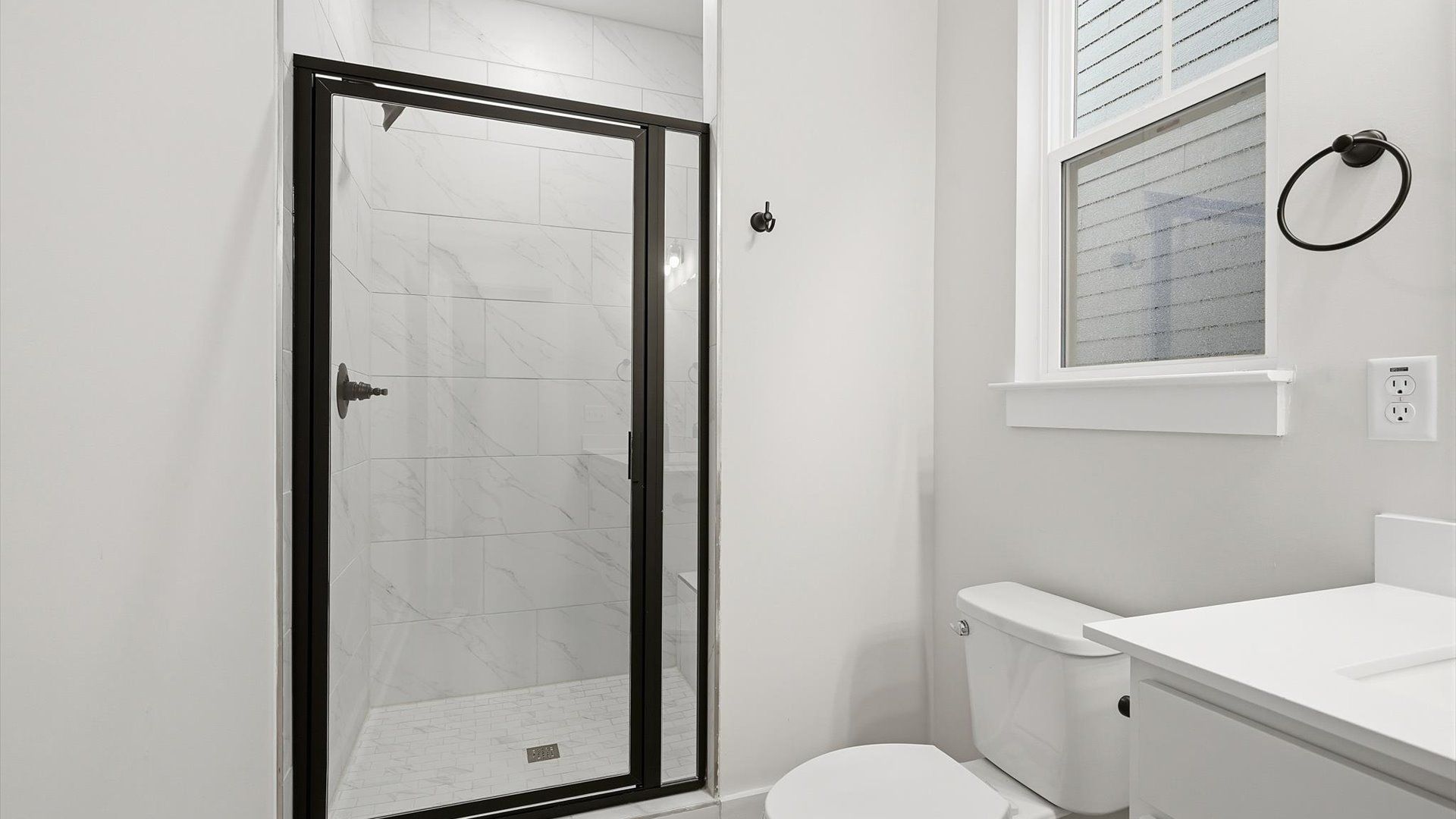 Highly functional and elegant en-suite with a tiled walk-in shower and refined finishes located in Fountain Inn, SC