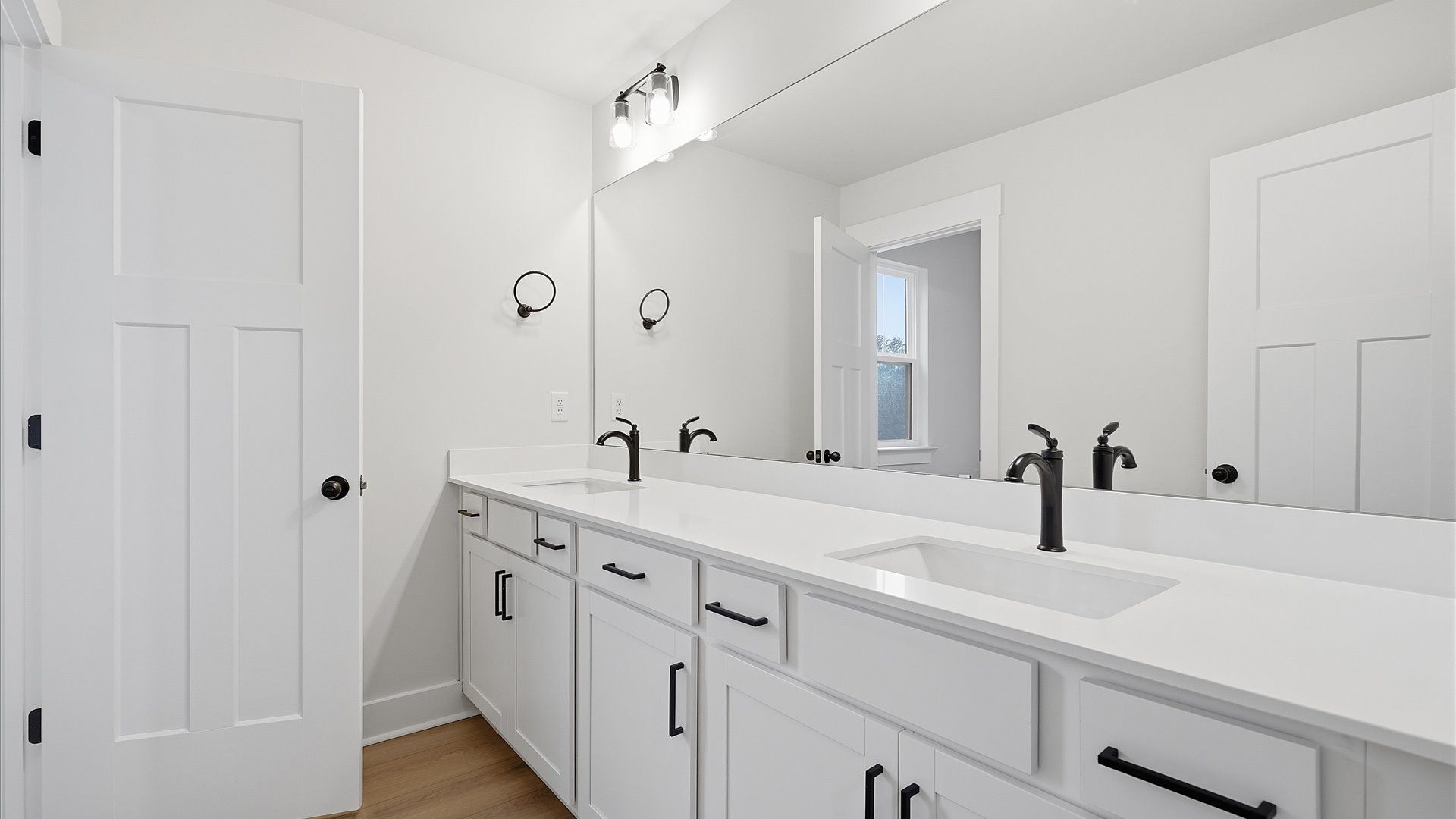 Accomplished full bath designed with both comfort and sophistication in mind by DRB Homes