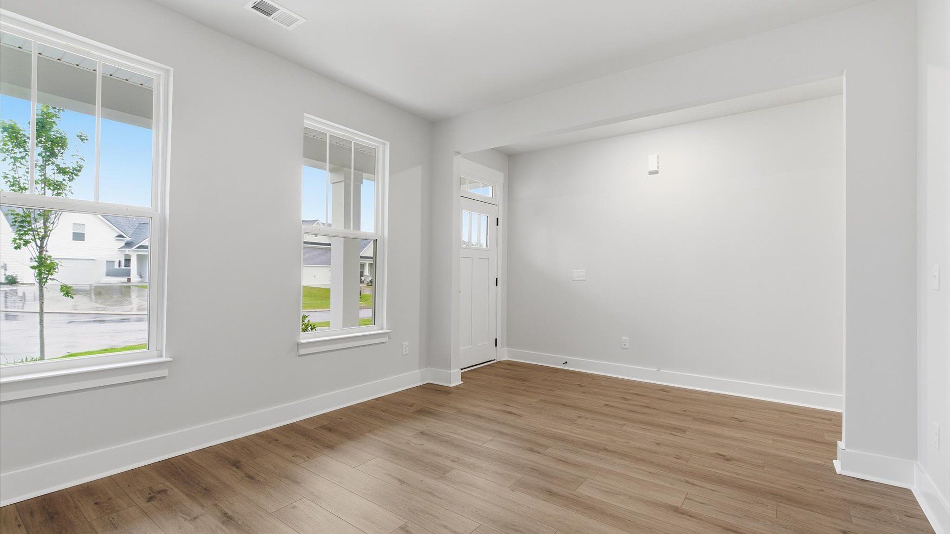 Established charm meets modern elegance in this first-rate flex room by DRB Homes
