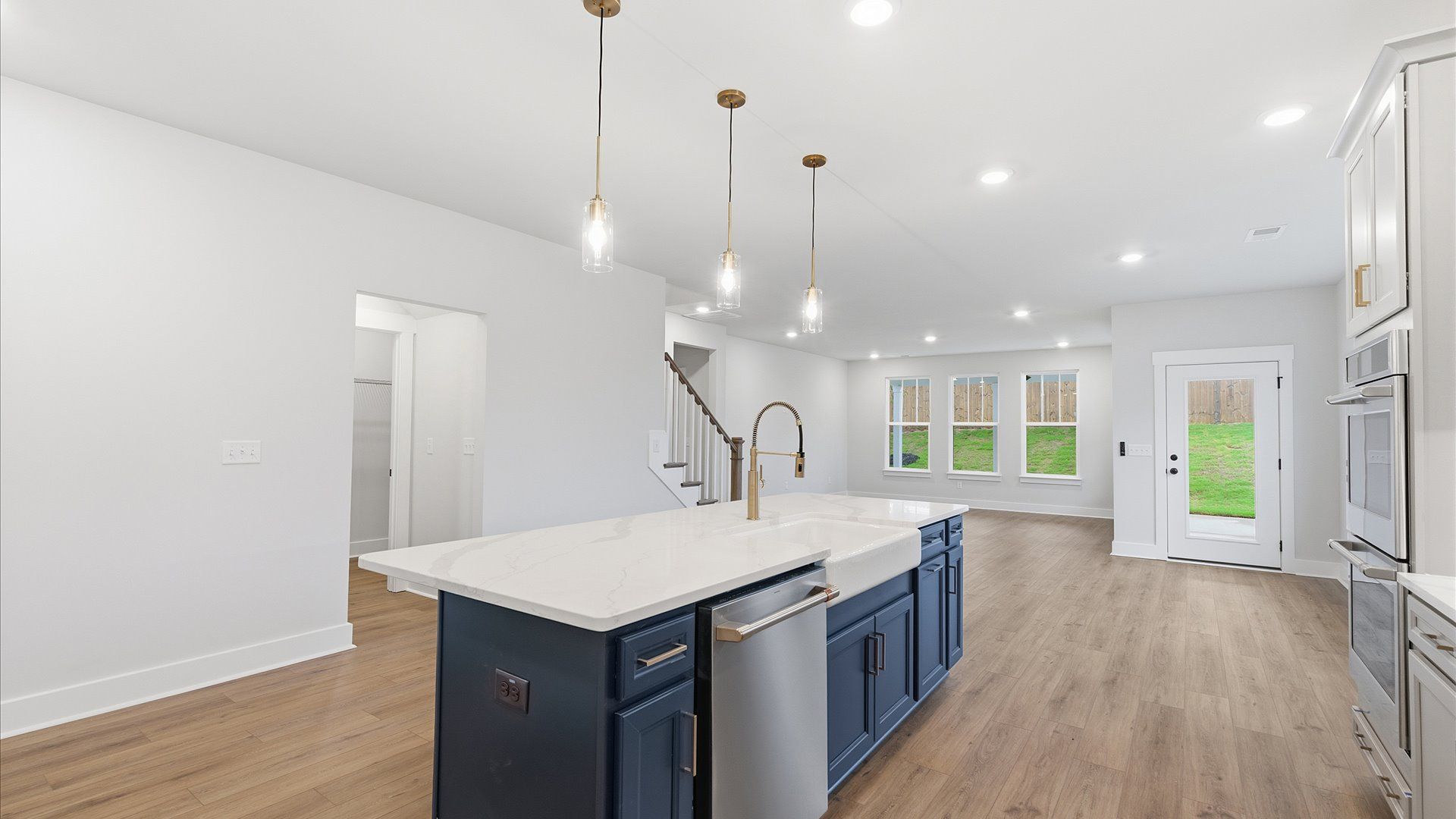 Top-notch kitchen featuring pendant lighting over a statement 9-foot island located in Piedmont, SC