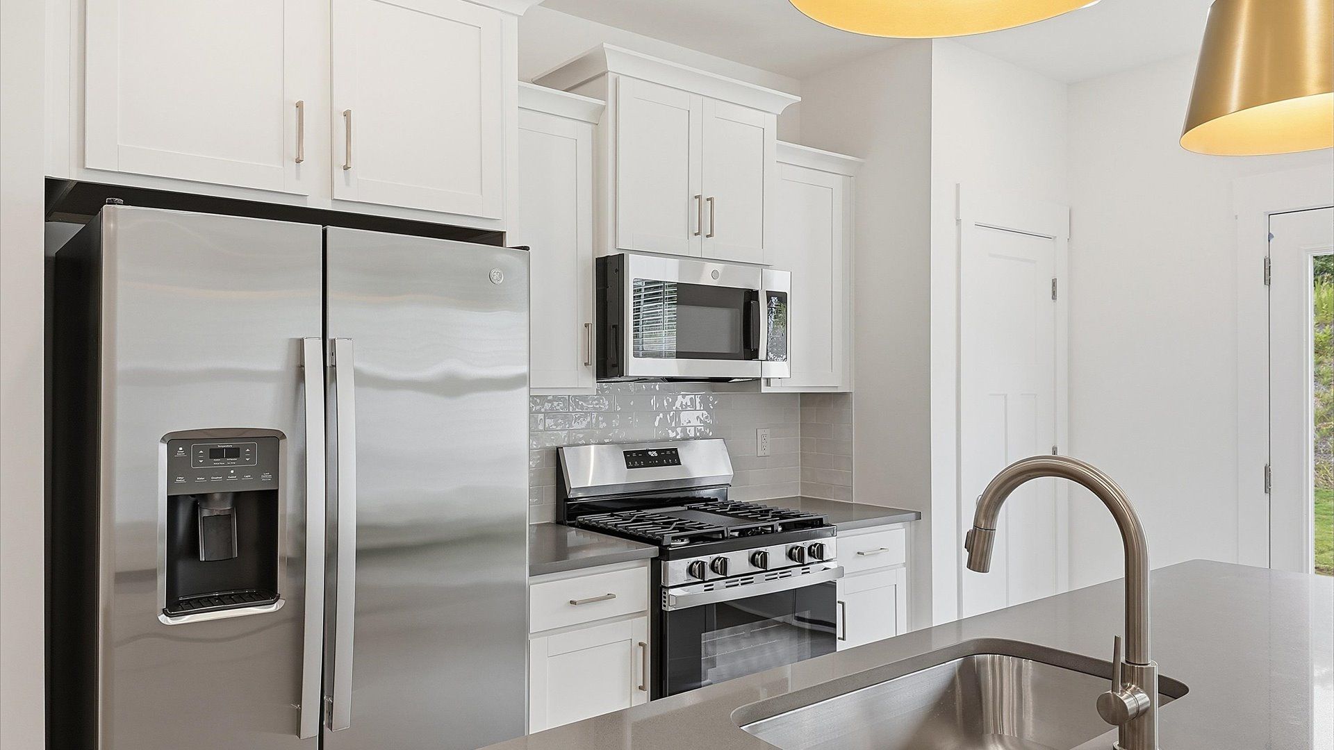 Contemporary kitchen featuring premium countertops and streamlined cabinetry at Marion Square