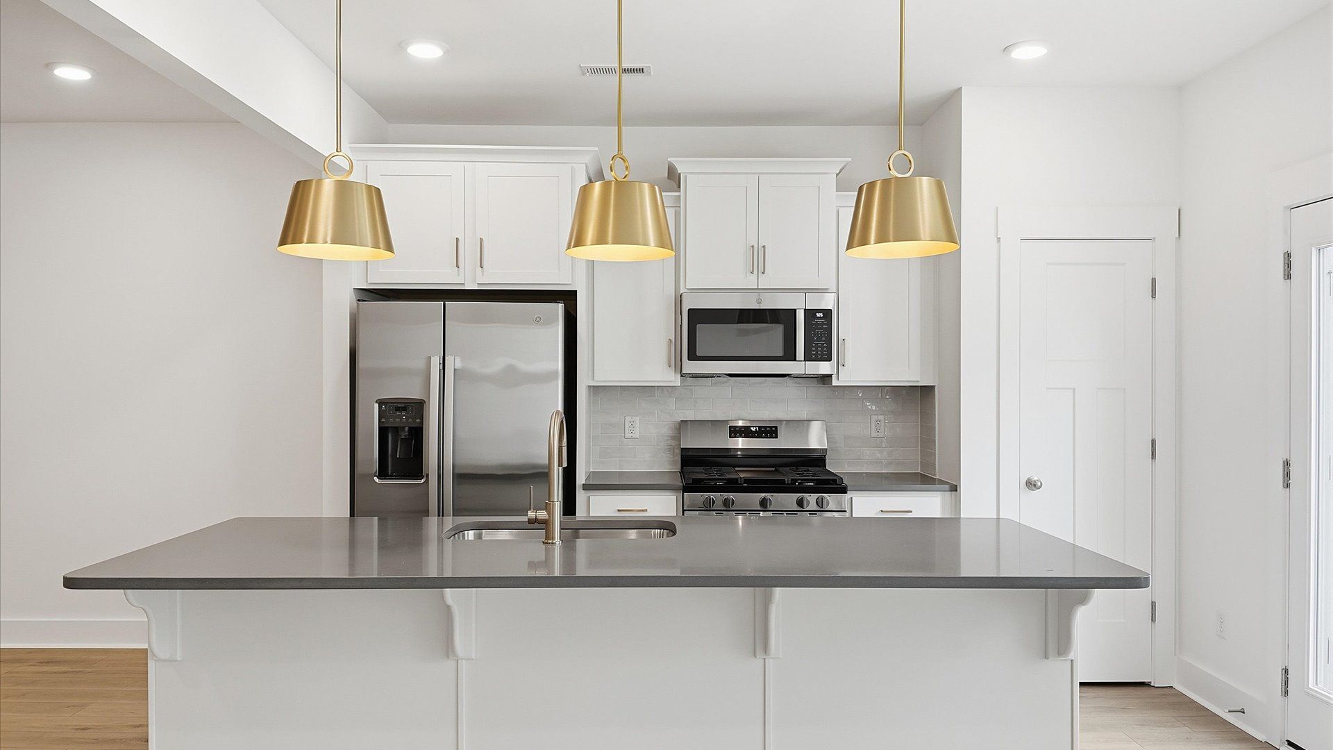 Well-designed kitchen with a center island and tasteful finishes that elevate everyday living near Downtown Greenville, SC