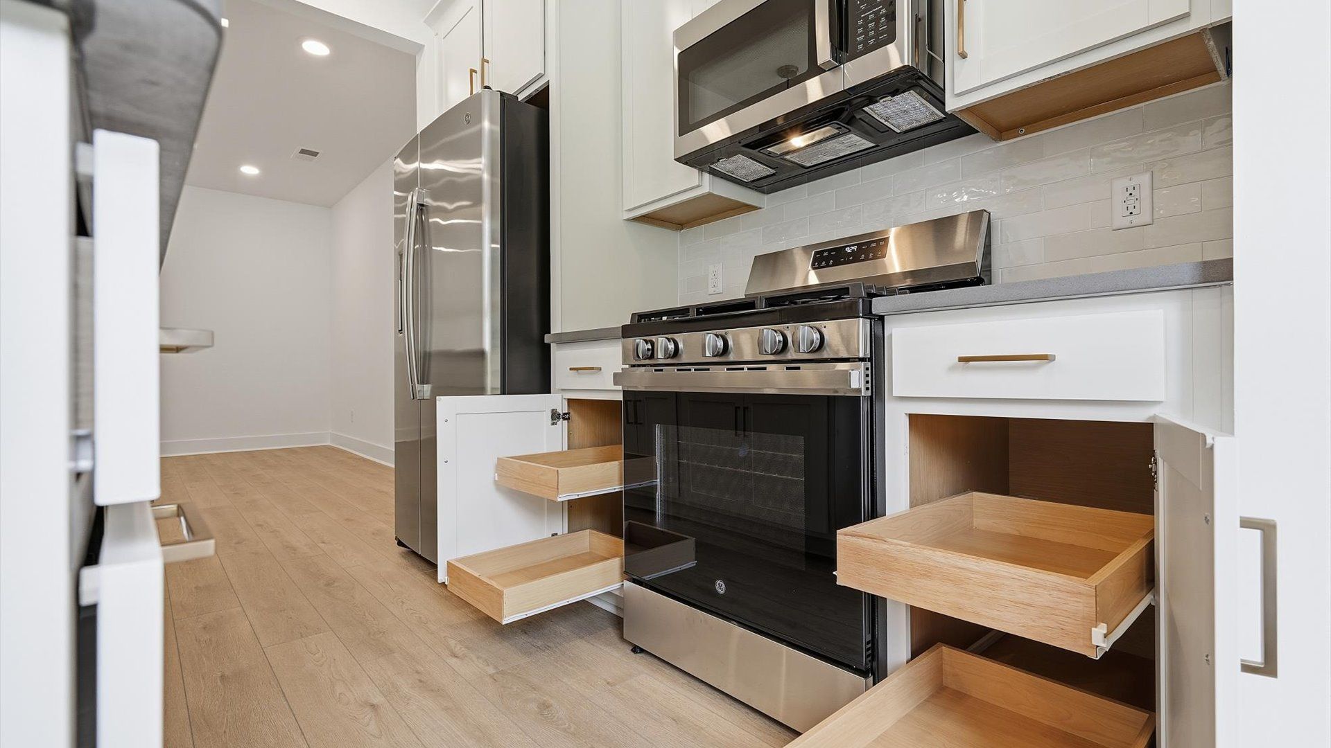 Luxury-inspired kitchen featuring expansive storage space and elegant design elements located at Marion Square