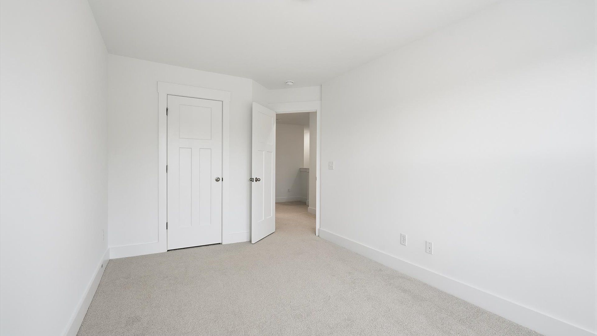 Well-crafted bedroom offering premium comfort and expansive storage solutions at the new Marion Square community