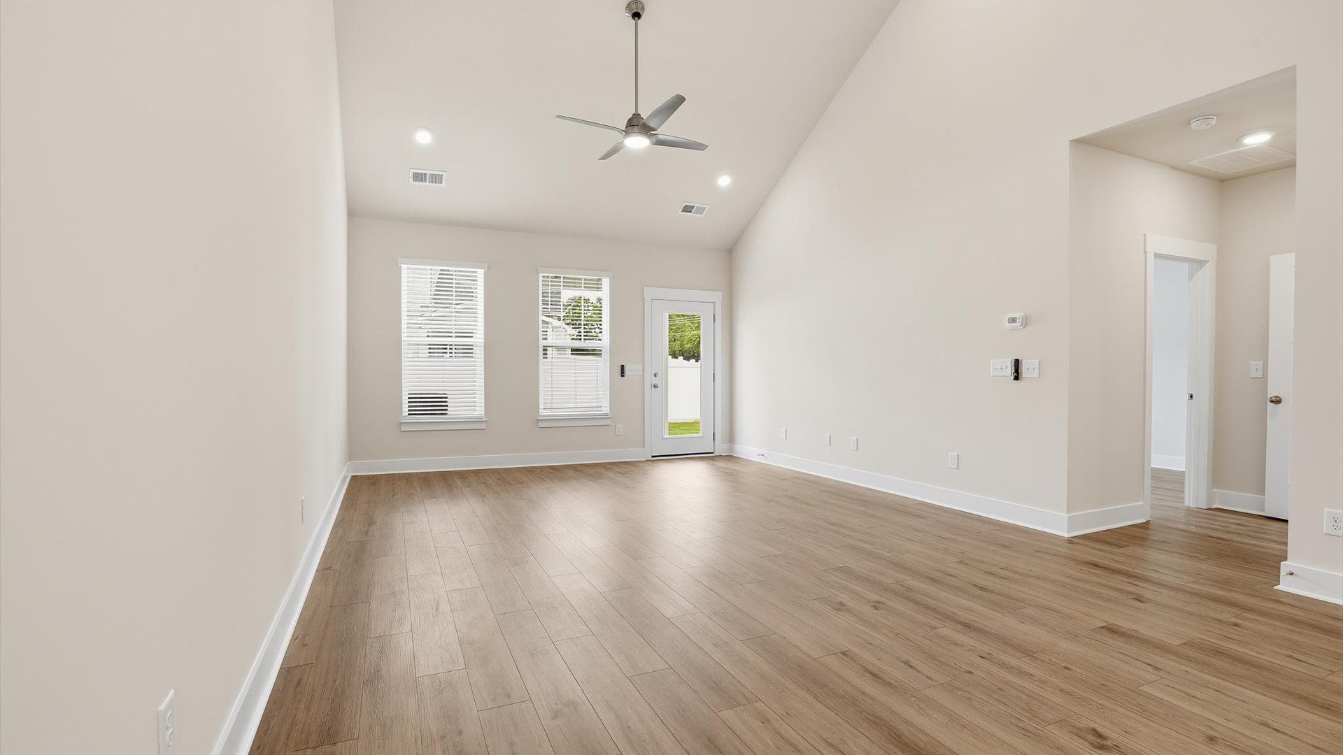 Exceptional family space with hardwood floors and seamless flow to dining and kitchen areas near Downtown Anderson