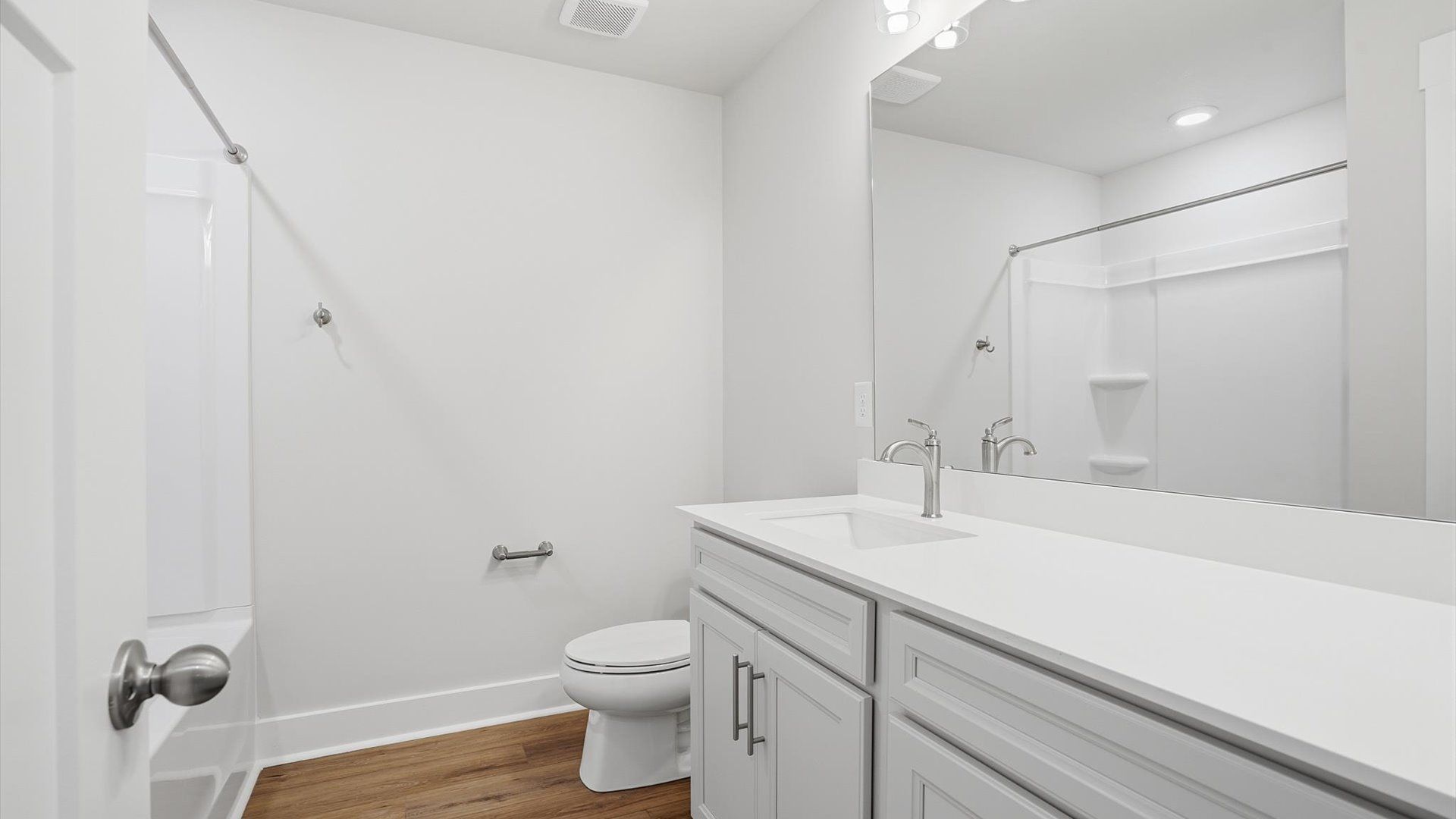 Notable full bathroom offering tasteful details and a bright, functional space by DRB Homes