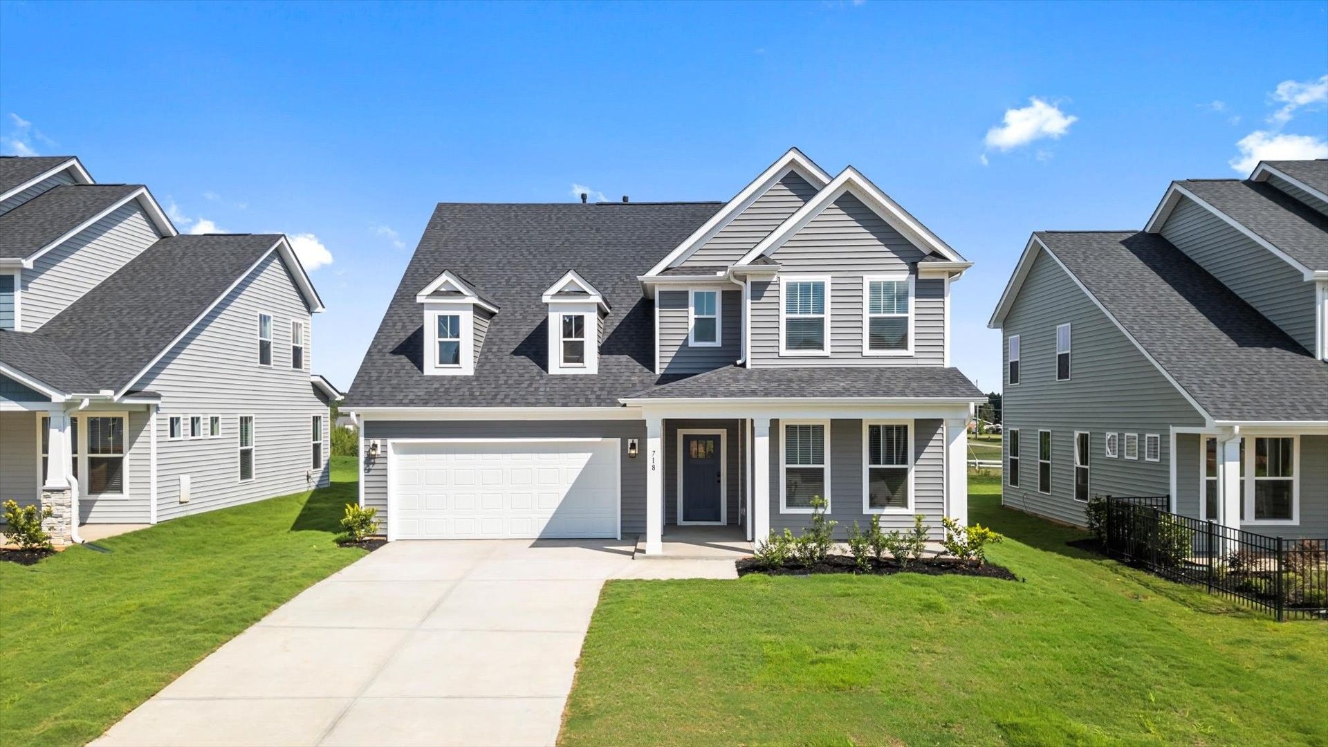 Notable street presence with tasteful elevation and thoughtful landscaping of the Drayton floorplan