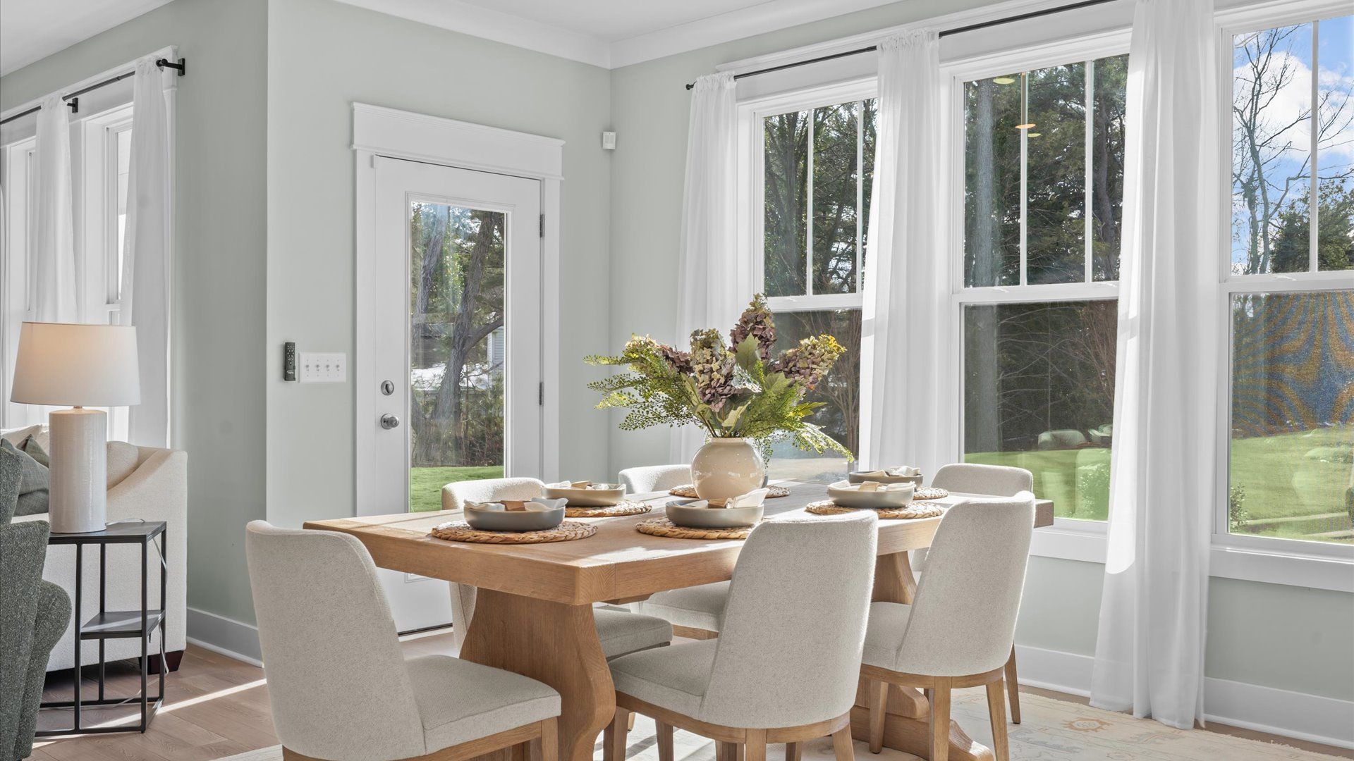 Inviting breakfast area with a seamless connection to the kitchen for everyday living at the Hinson Farm community