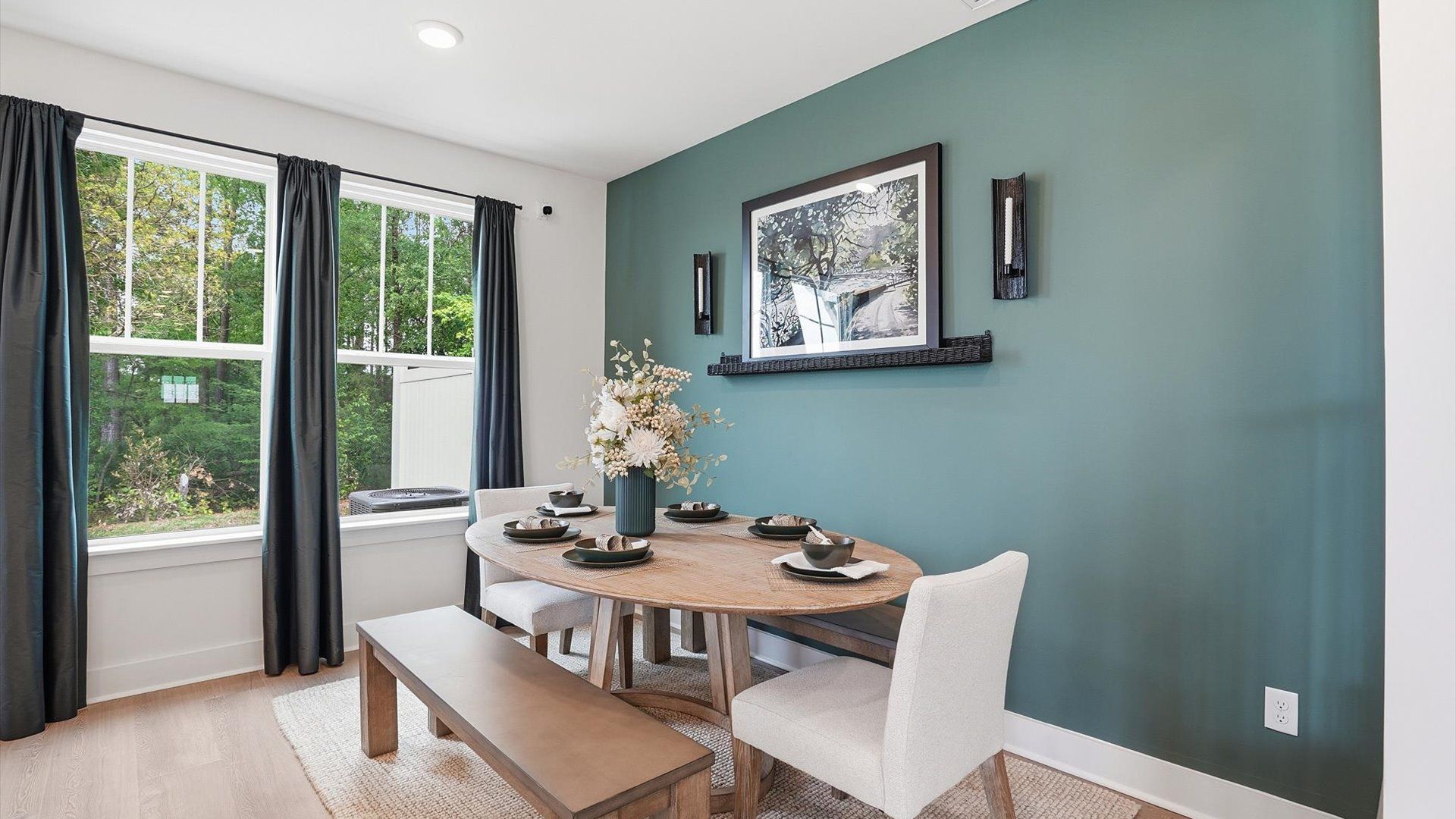Light-filled breakfast area offering a comfortable space to gather and unwind