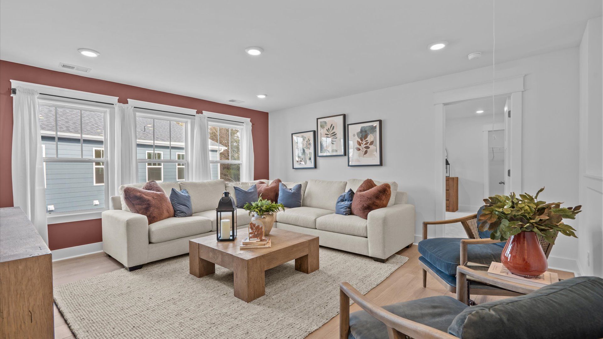 Functional loft with tasteful hardwood floors and exceptional natural light in a modern home near Downtown Fountain Inn