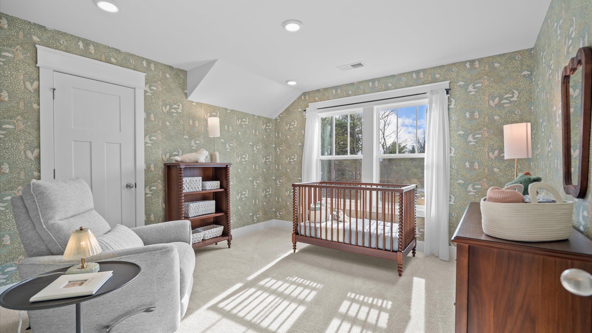 Accomplished bedroom layout with cozy carpet, a spacious walk-in closet, and sun-filled windows by DRB Homes