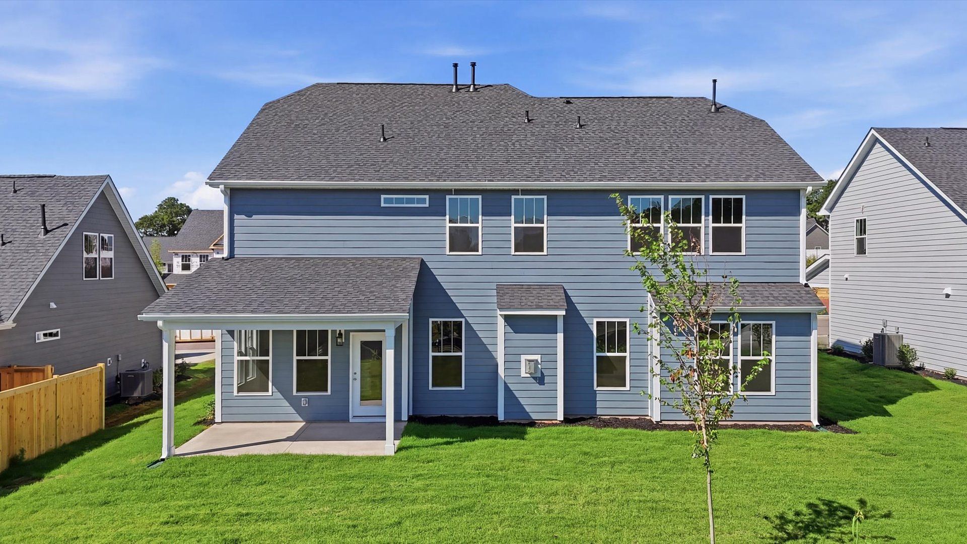 Exclusive rear covered porch with accomplished detail and elevated outdoor living potential at Kayfield at Midway
