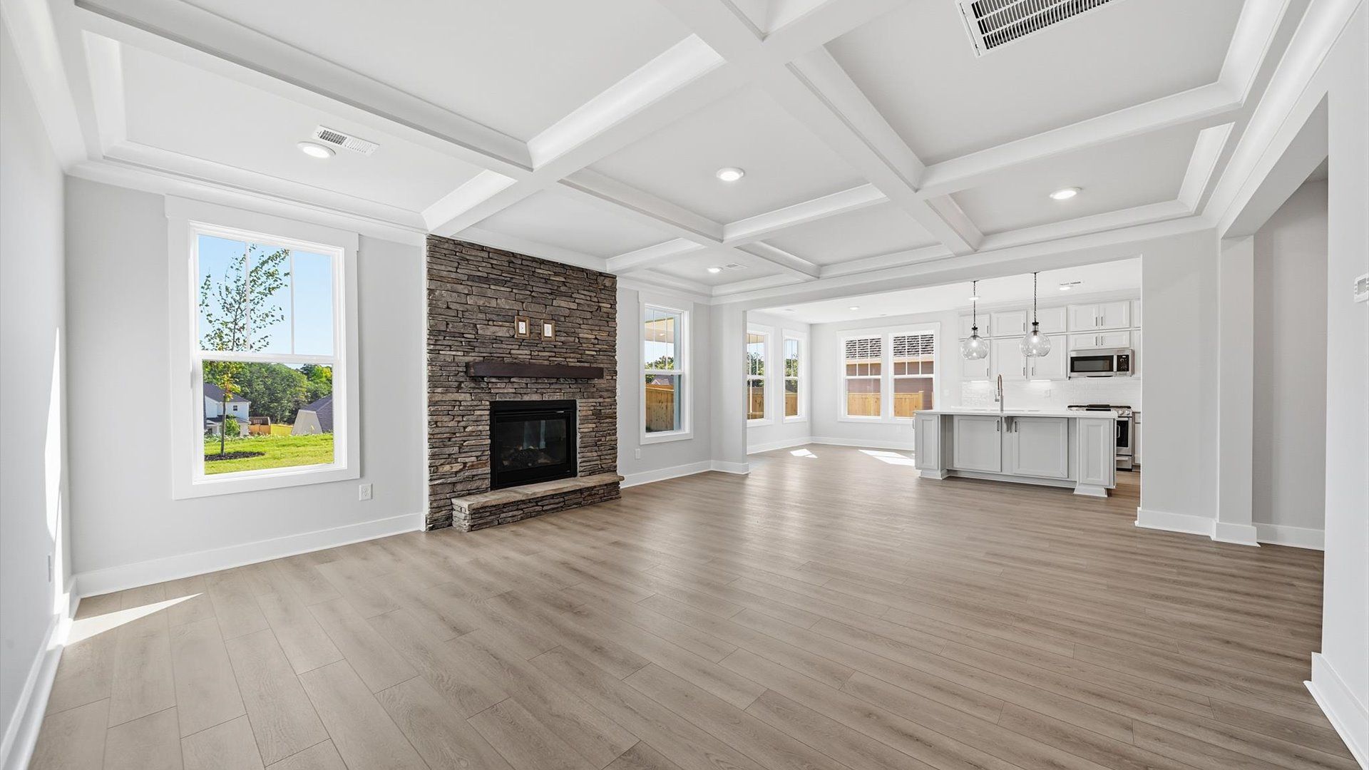 Notable family room designed with high standards—perfect for both everyday living and entertaining at Kayfield at Midway