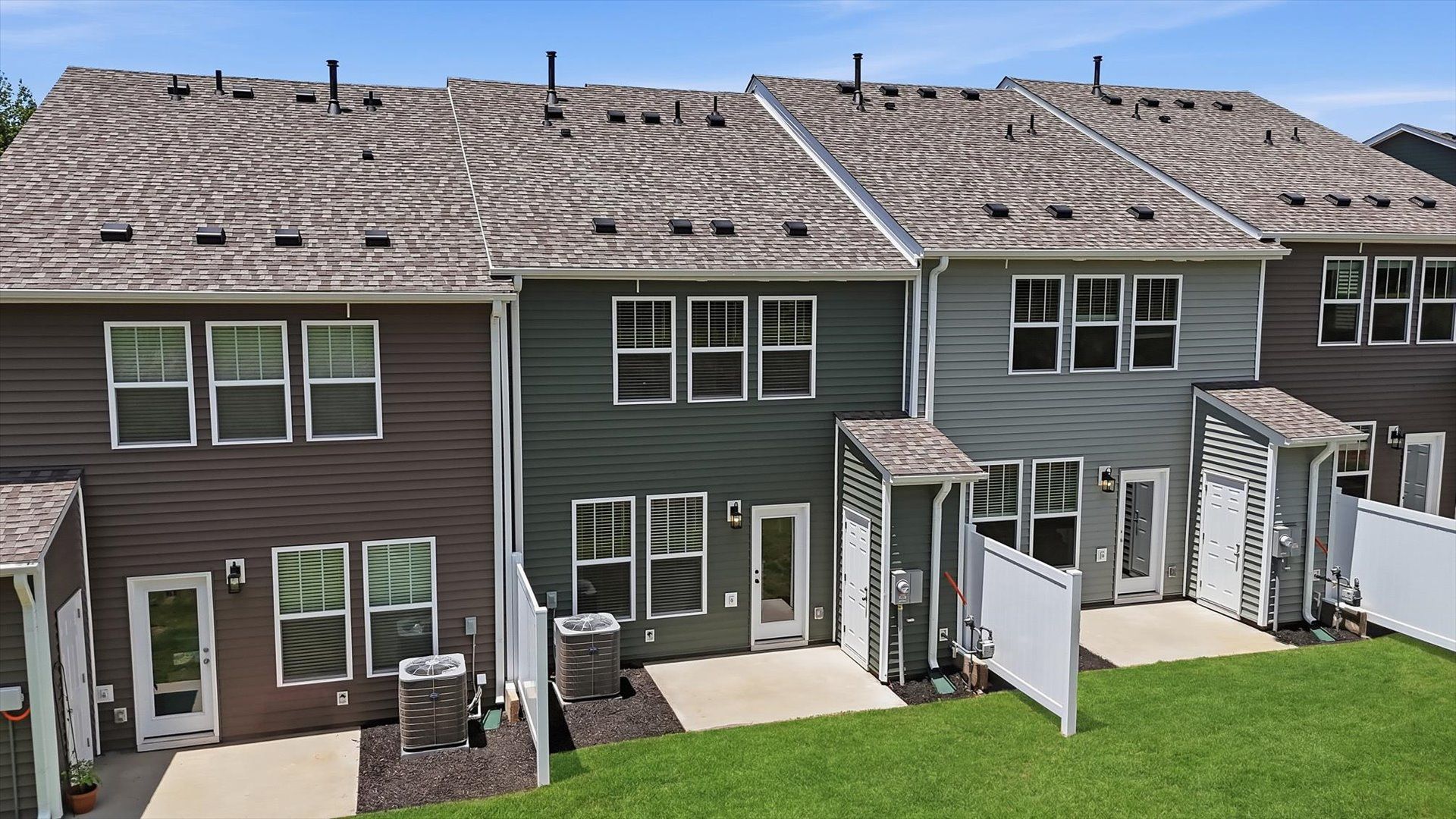 Vibrant rear outdoor space featuring a private patio and exceptional craftsmanship located near Downtown Greenville