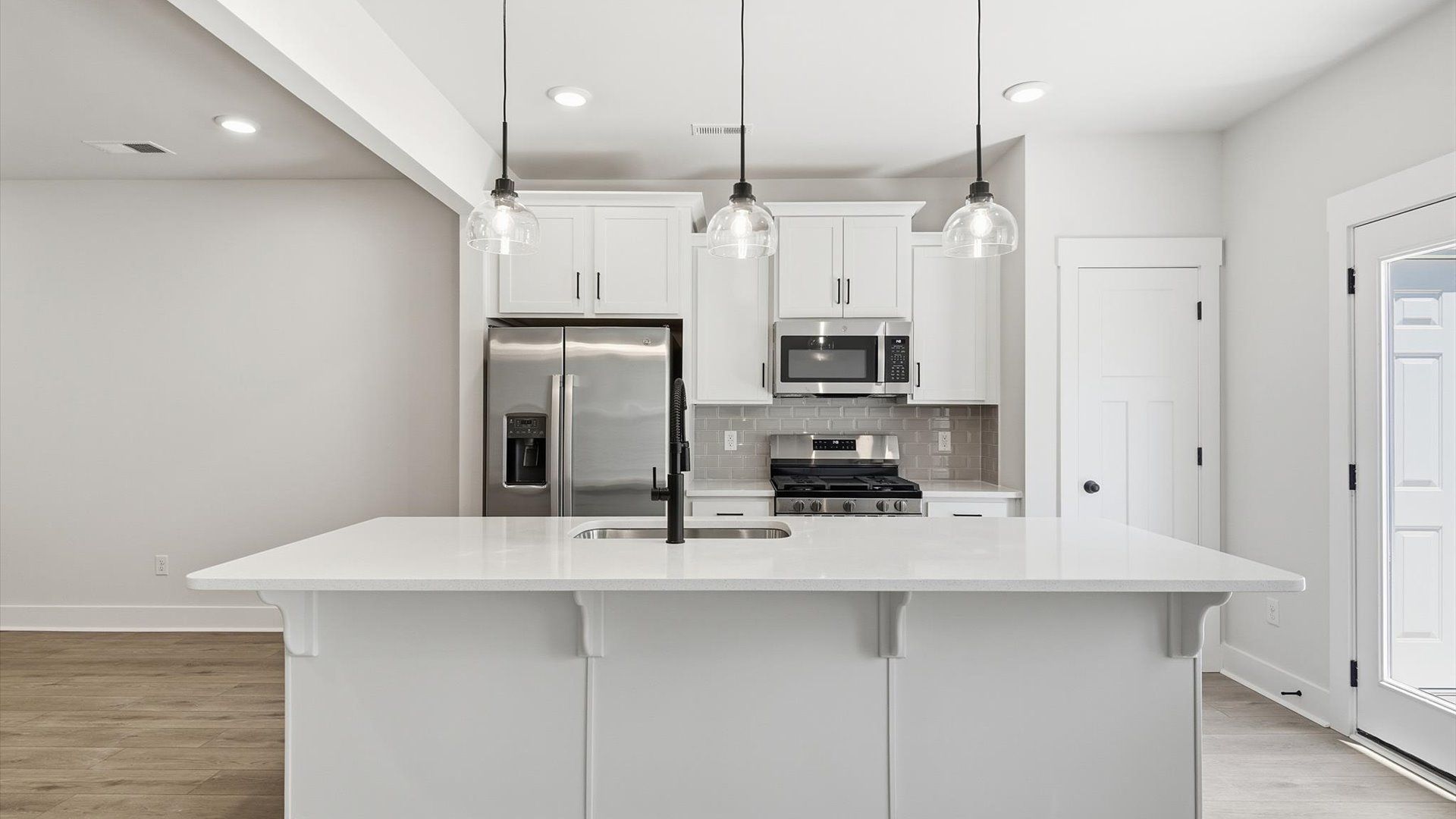Elegant kitchen with modern finishes in this first-class villa at Marion Square near Downtown Greenville, SC