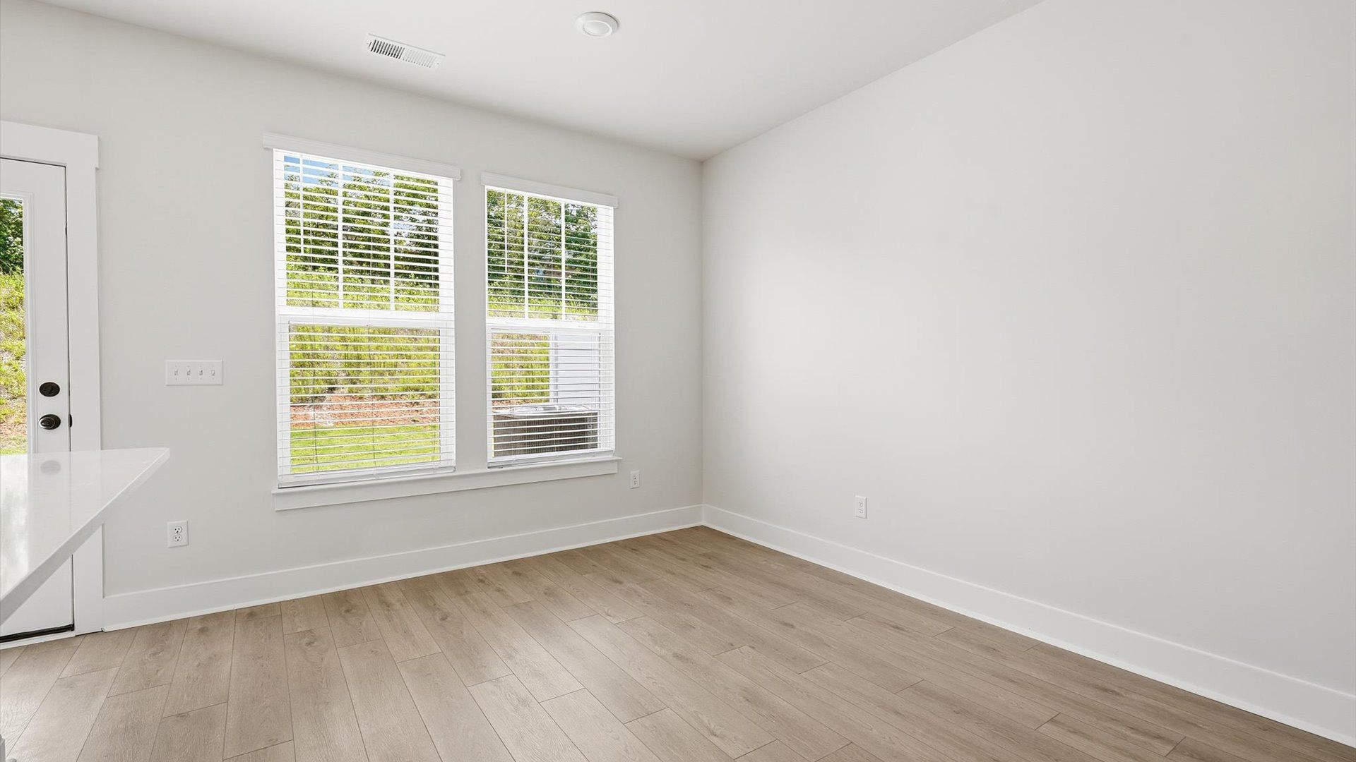 Charming breakfast area that blends comfort and function, providing a casual dining space at the Marion Square community