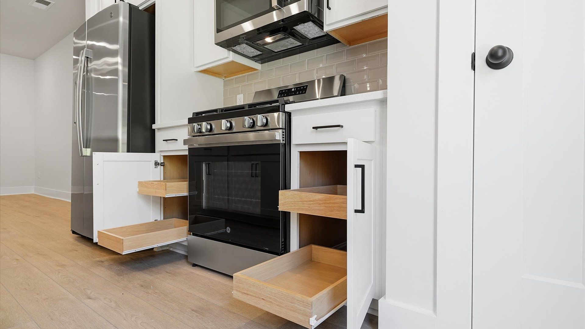 Functional kitchen with stainless steel appliances and ample storage—crafted to high standards by DRB Homes
