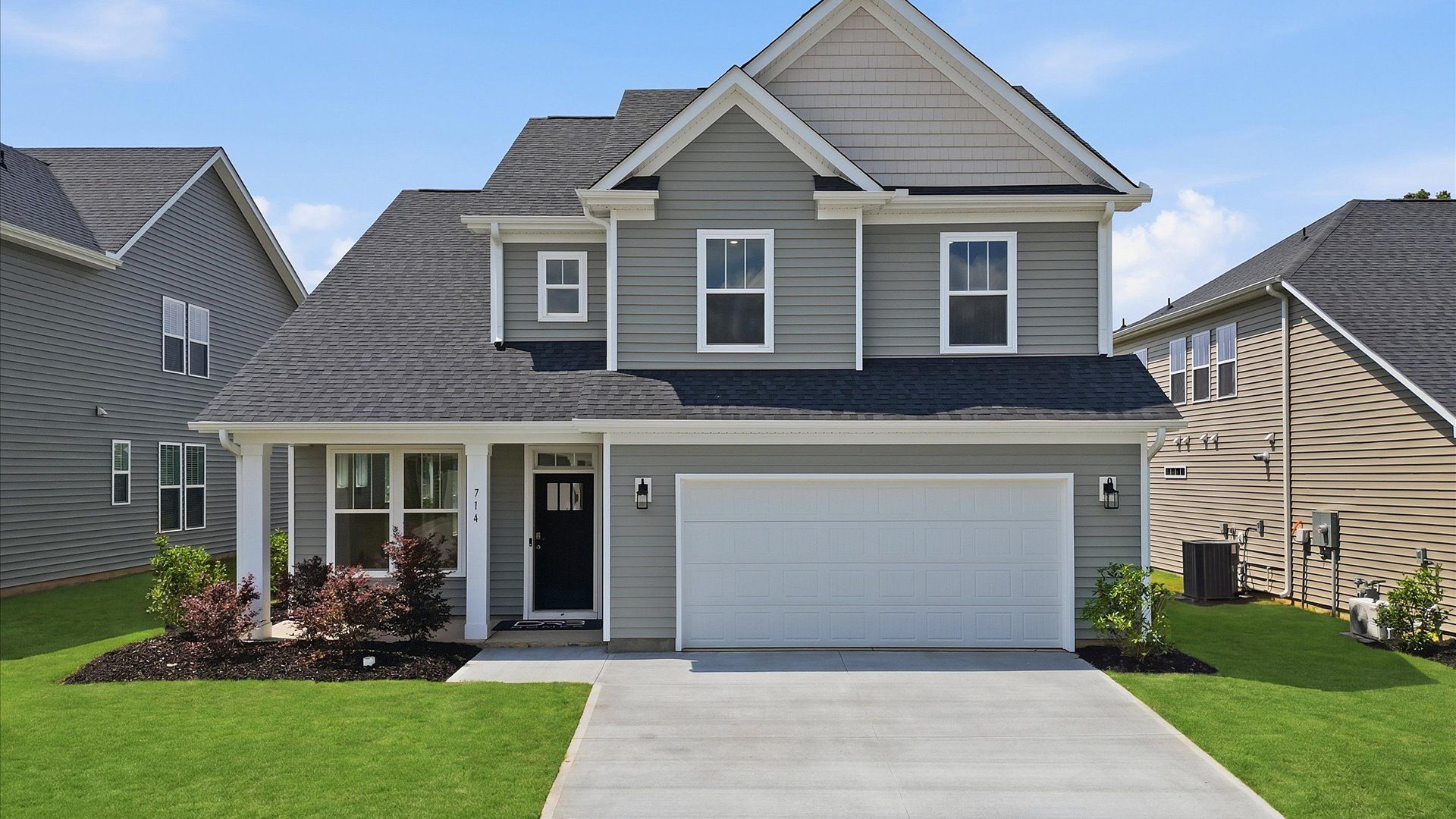 Exceptional home with tasteful exterior finishes and a thoughtfully designed façade located in Moore, SC