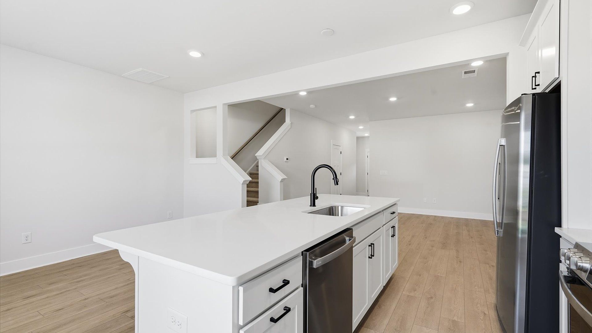 Memorable meals begin in this vibrant kitchen with quartz countertops and a thoughtfully designed island in Piedmont, SC