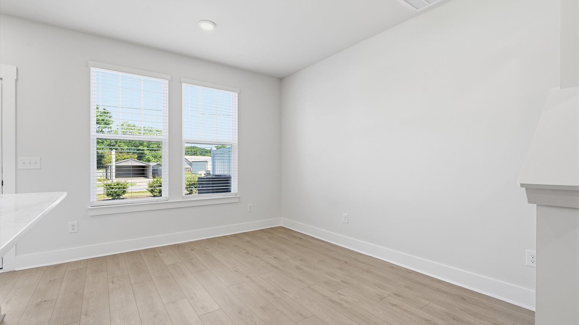 Inviting breakfast area with a seamless connection to the kitchen for everyday living at the Saluda Crossing community