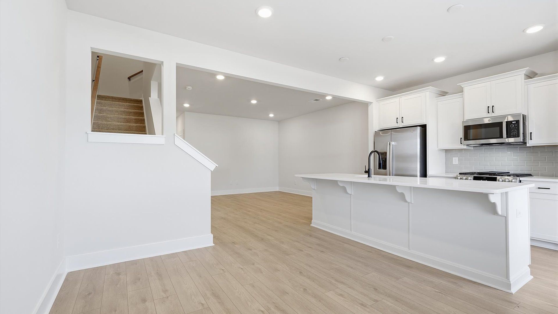 Light-filled breakfast area offering a comfortable space to gather and unwind by DRB Homes