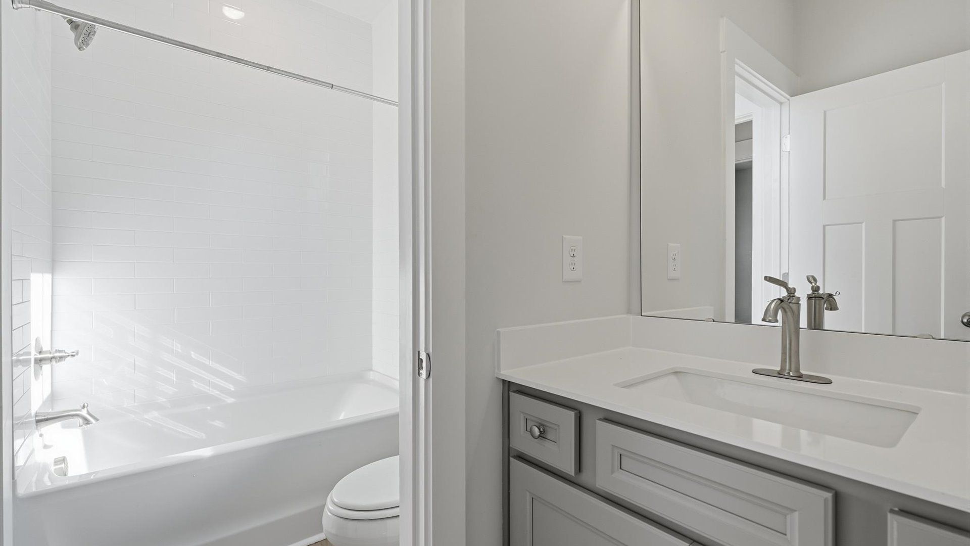 Well-appointed full bath with high standards of craftsmanship and everyday function at the Wells Crossing community