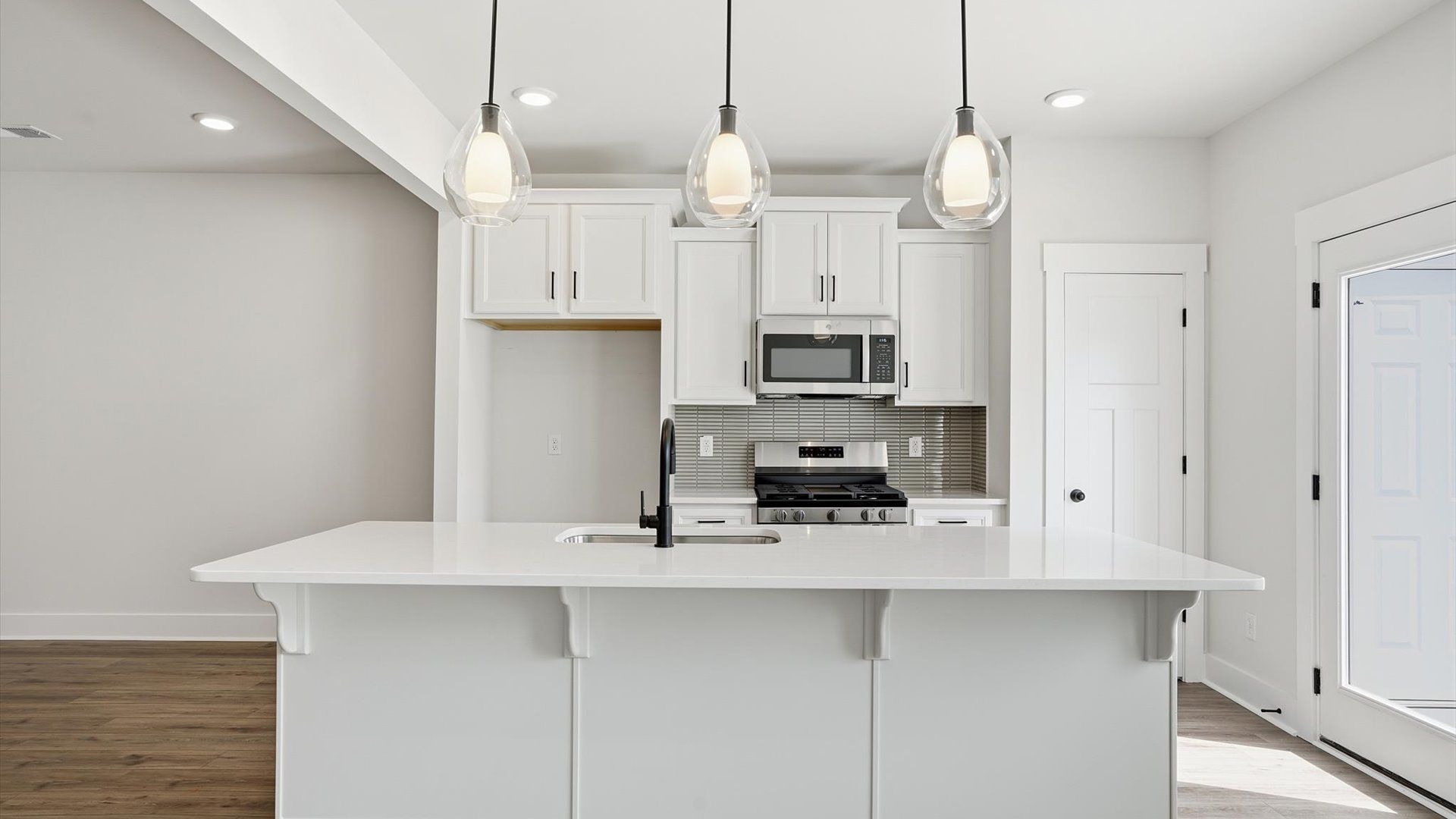 First-rate kitchen with a center island and superior cabinetry in a thoughtfully designed space at Barton Hollow