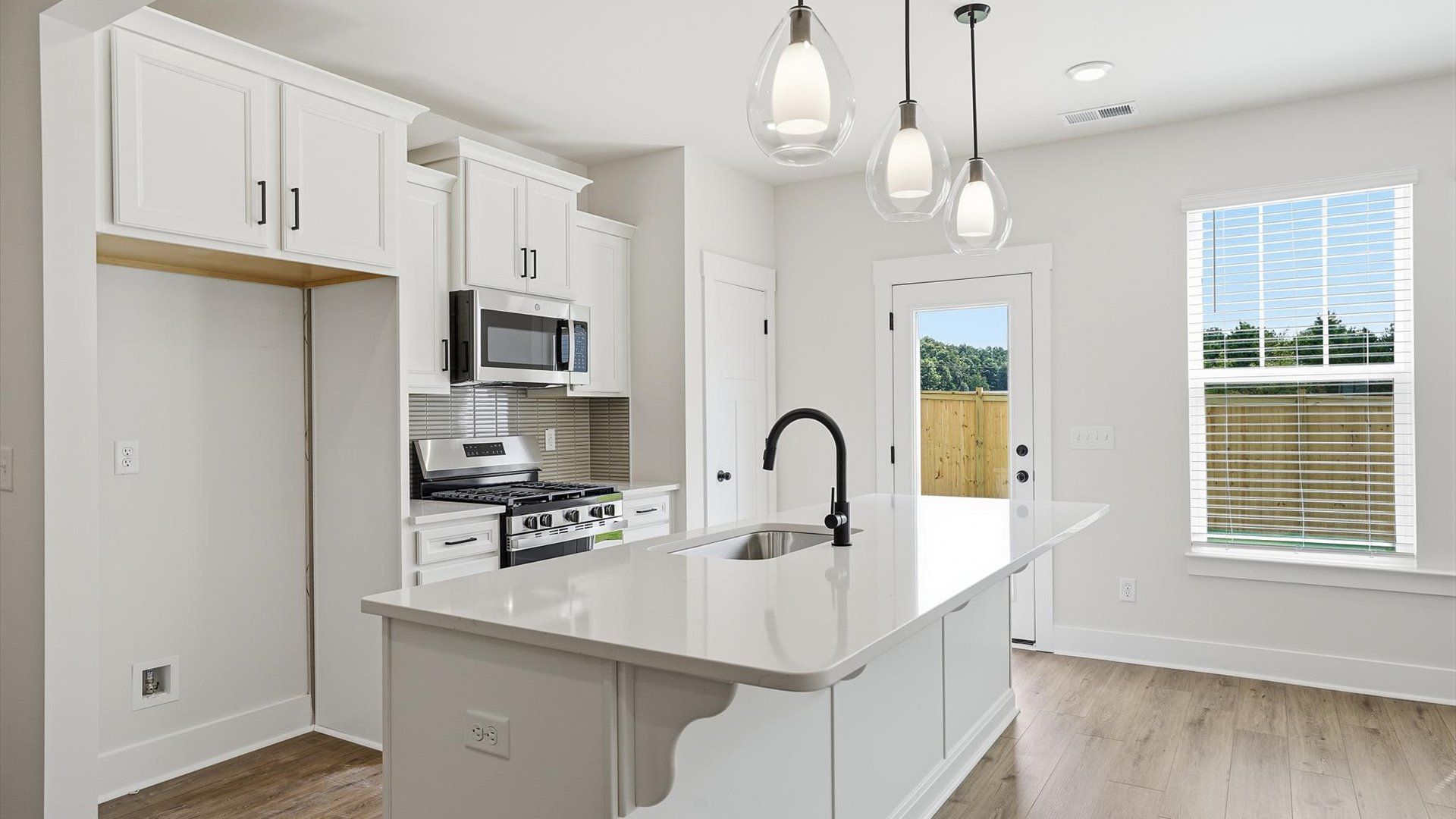 Accomplished design in a kitchen that blends function and form with a right-sized island in Fountain Inn, SC