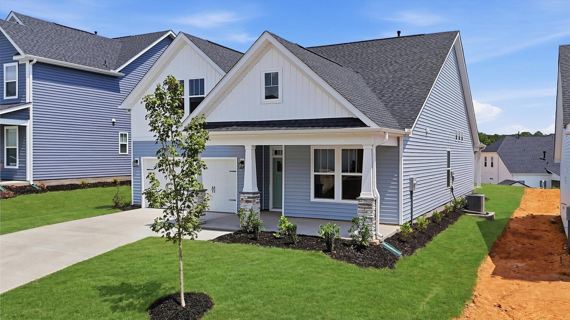 Functional design and eye-catching details in this accomplished single family home at Iris Meadows