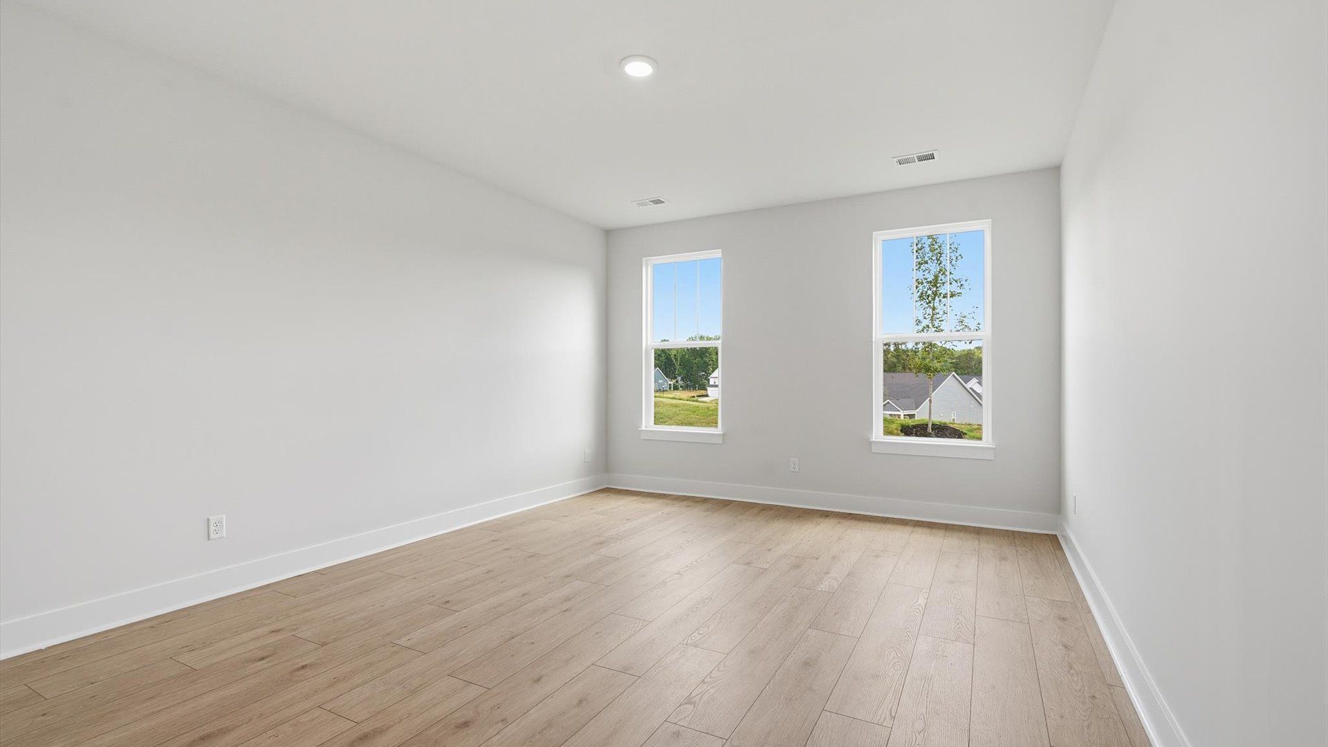 Spacious and serene primary suite with thoughtful design in a desirable DRB Homes community