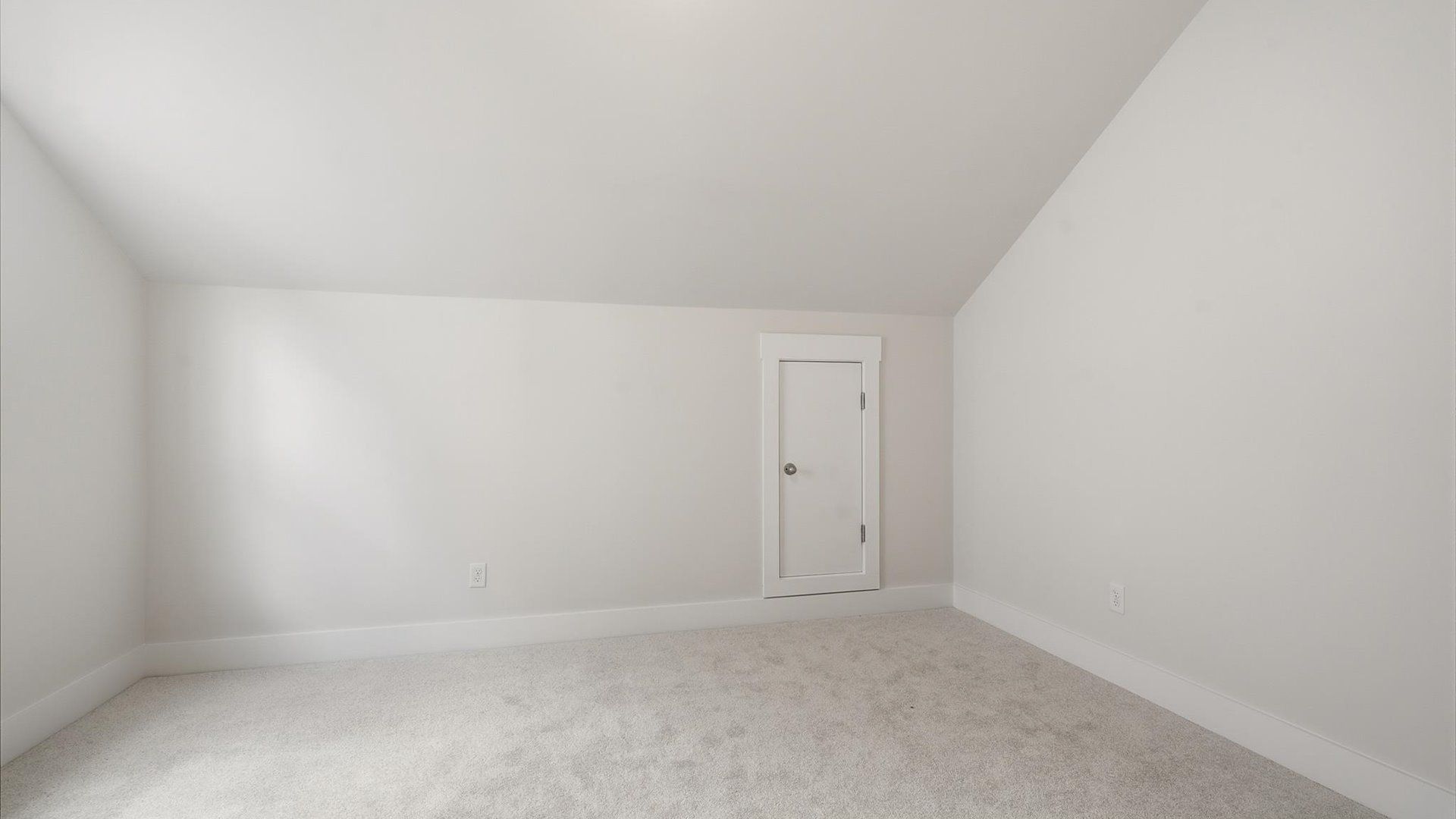 Vibrant and inviting secondary bedroom featuring a walk-in closet and refined finishes in Moore, SC