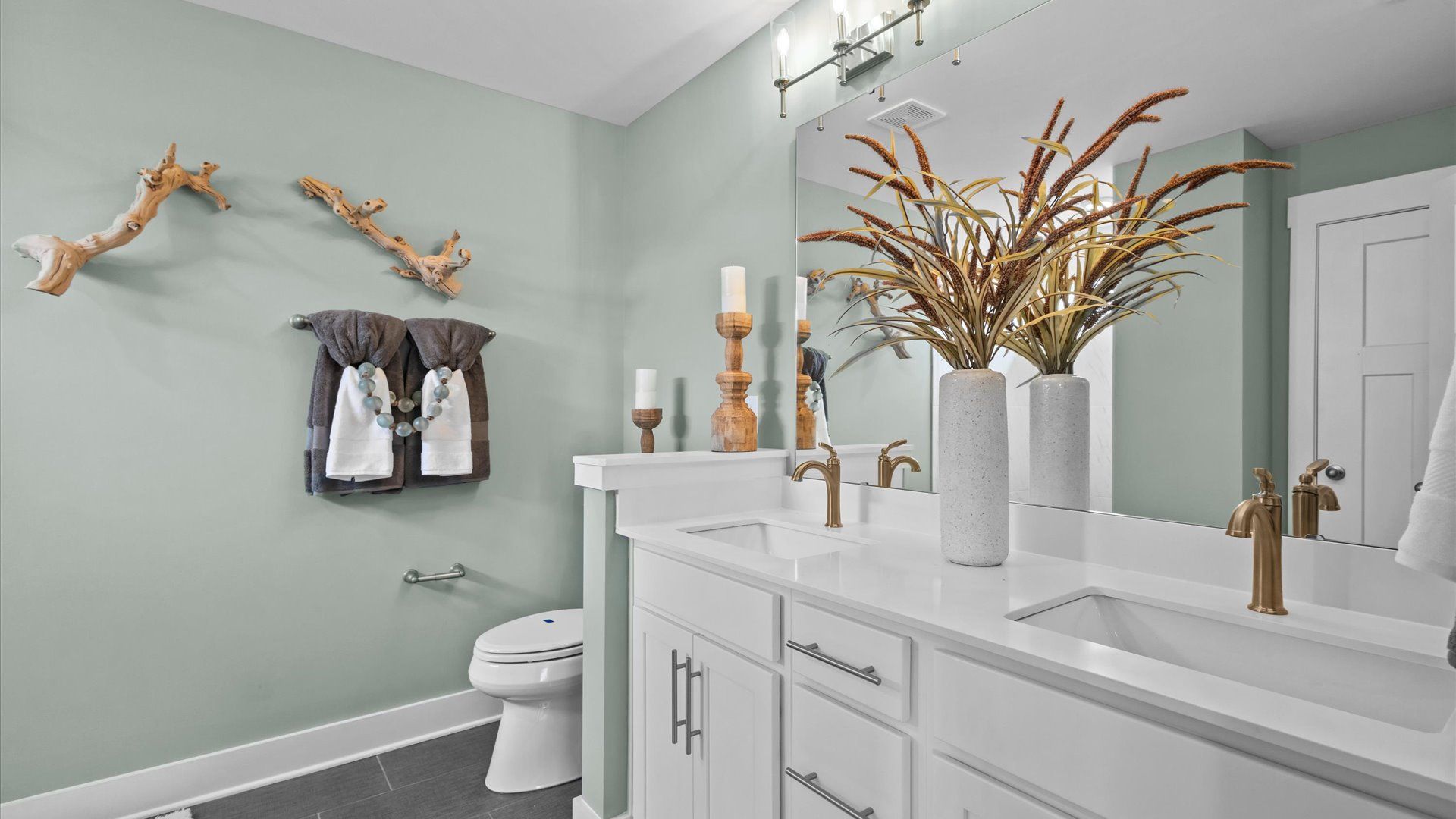 Primary bathroom designed for everyday comfort with elegant finishes throughout