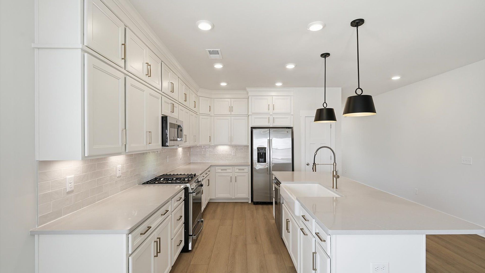 Beautifully appointed kitchen with spacious counters and sophisticated detailing located at Walnut Ridge