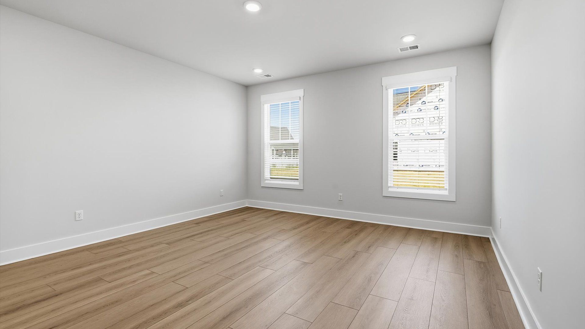 Memorable mornings begin in this tasteful and thoughtfully crafted primary suite near Lake Bowen