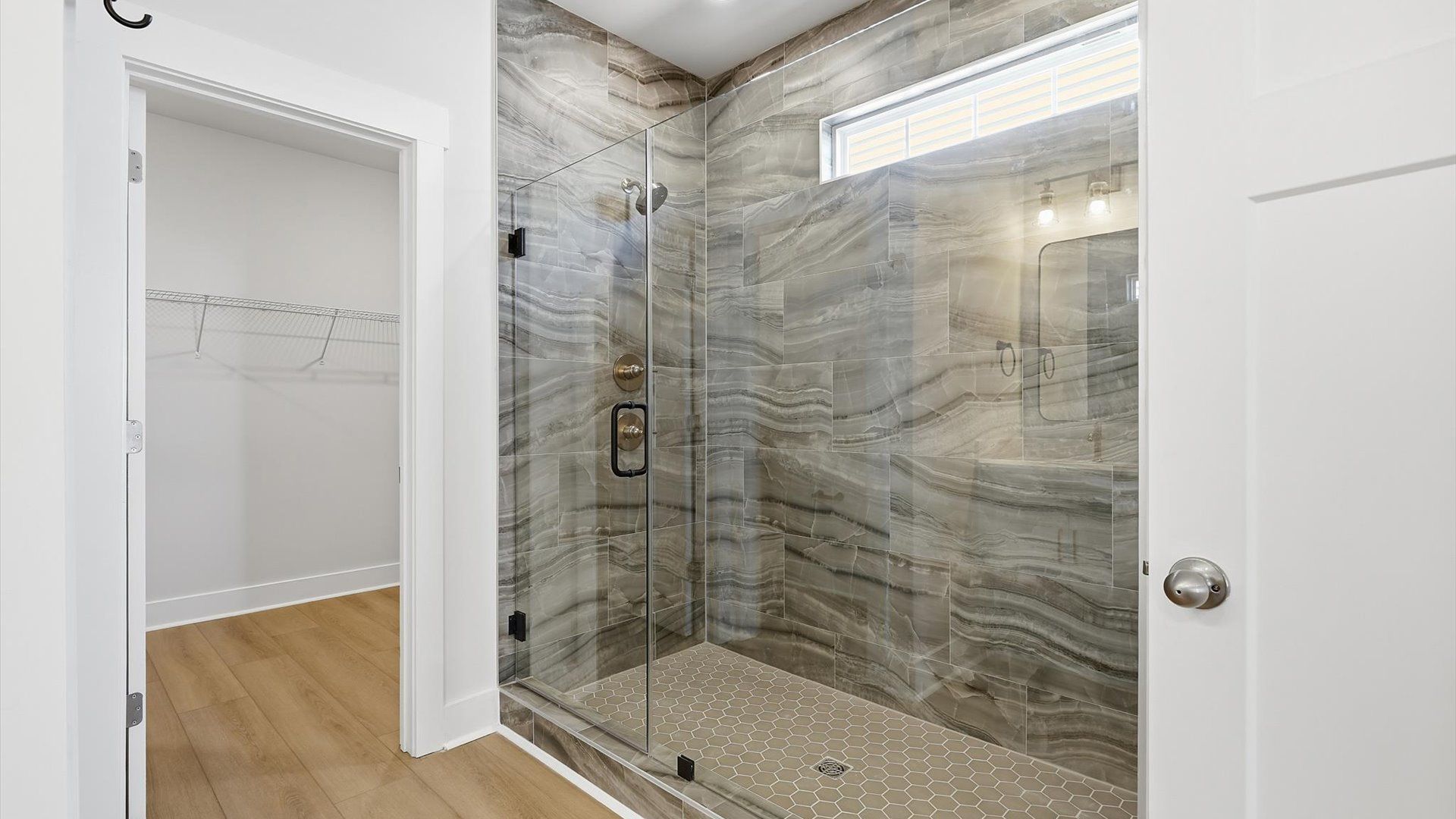 Superior en-suite primary bathroom with a stylish walk-in shower—crafted with high standards in mind in Inman, SC