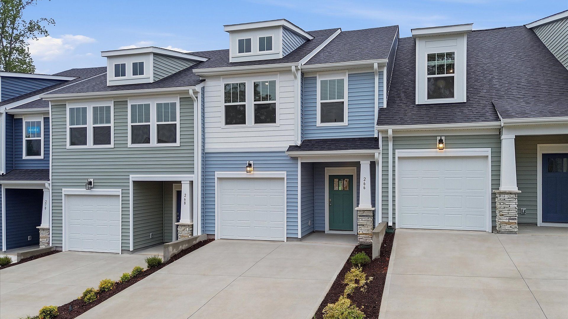 Exclusive DRB Homes exterior with balanced proportions and vibrant curb appeal