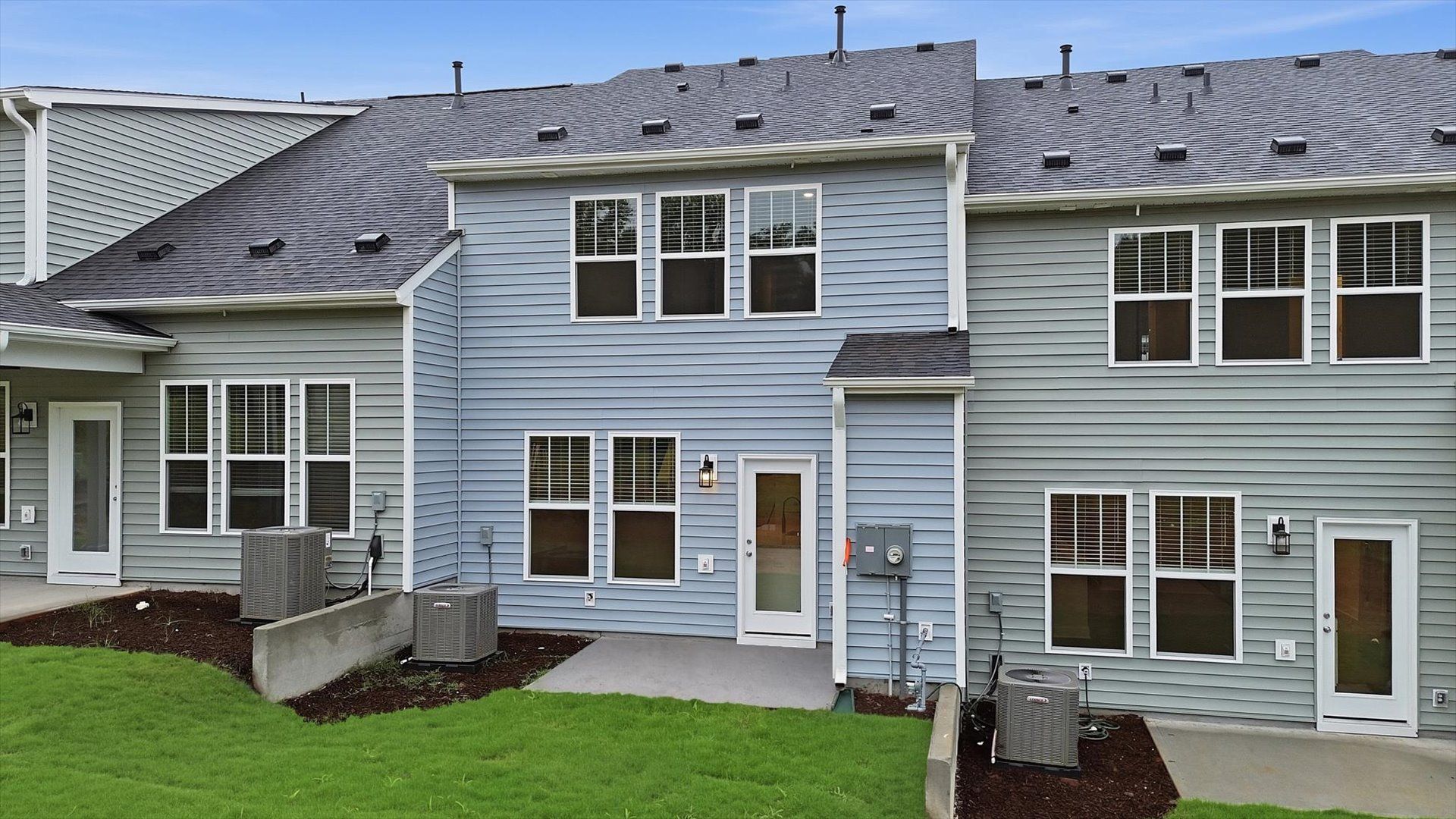 Tasteful and spacious backyard provides a peaceful retreat and effortless indoor-outdoor flow by DRB Homes