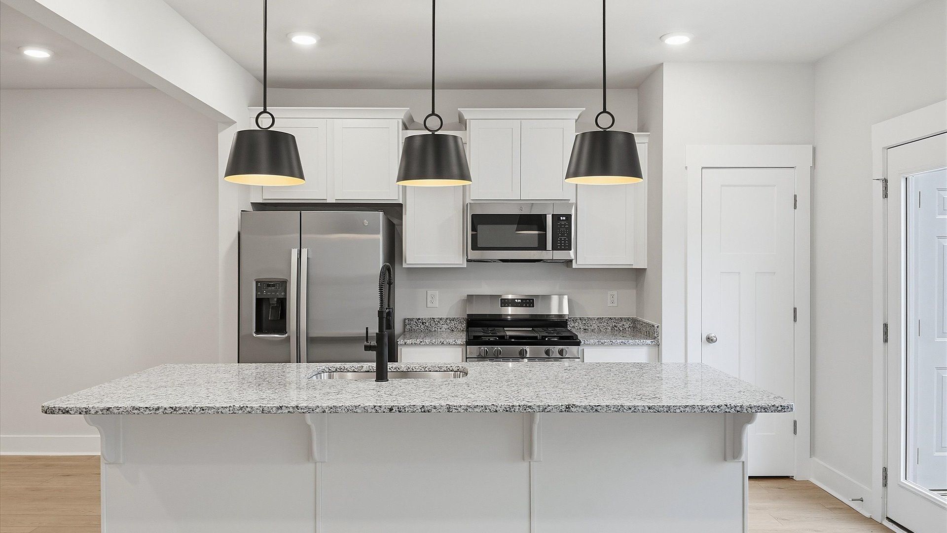 Well-designed kitchen with a center island and tasteful finishes that elevate everyday living in Lyman, SC