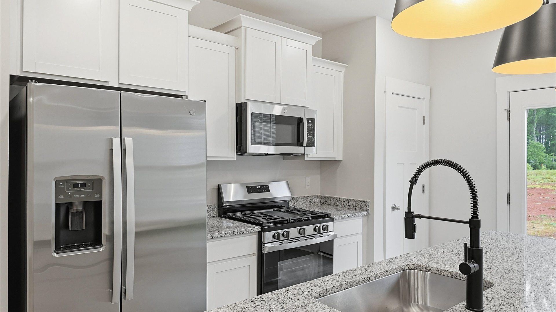 Accomplished layout with a first-class kitchen in this select villa community by DRB Homes