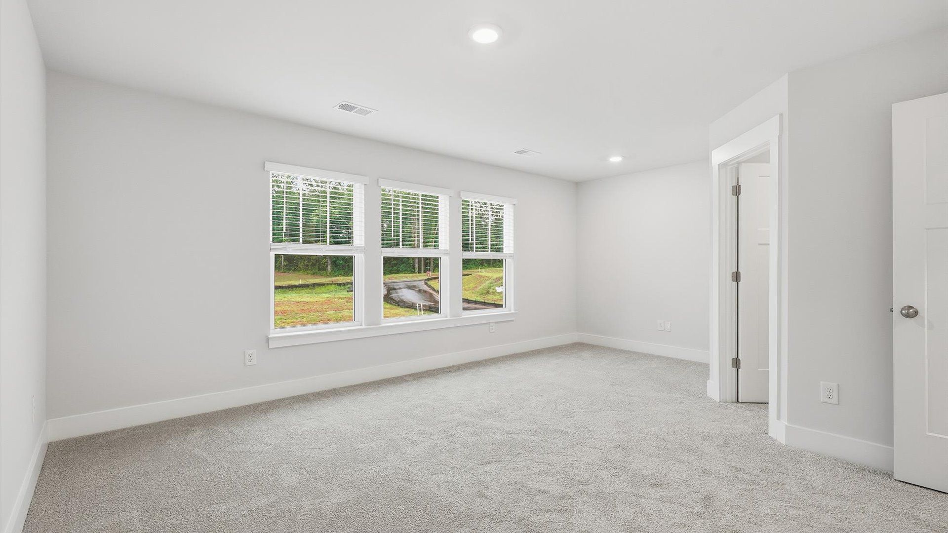 Luxurious primary retreat with spacious proportions and calming ambiance in Lyman, SC