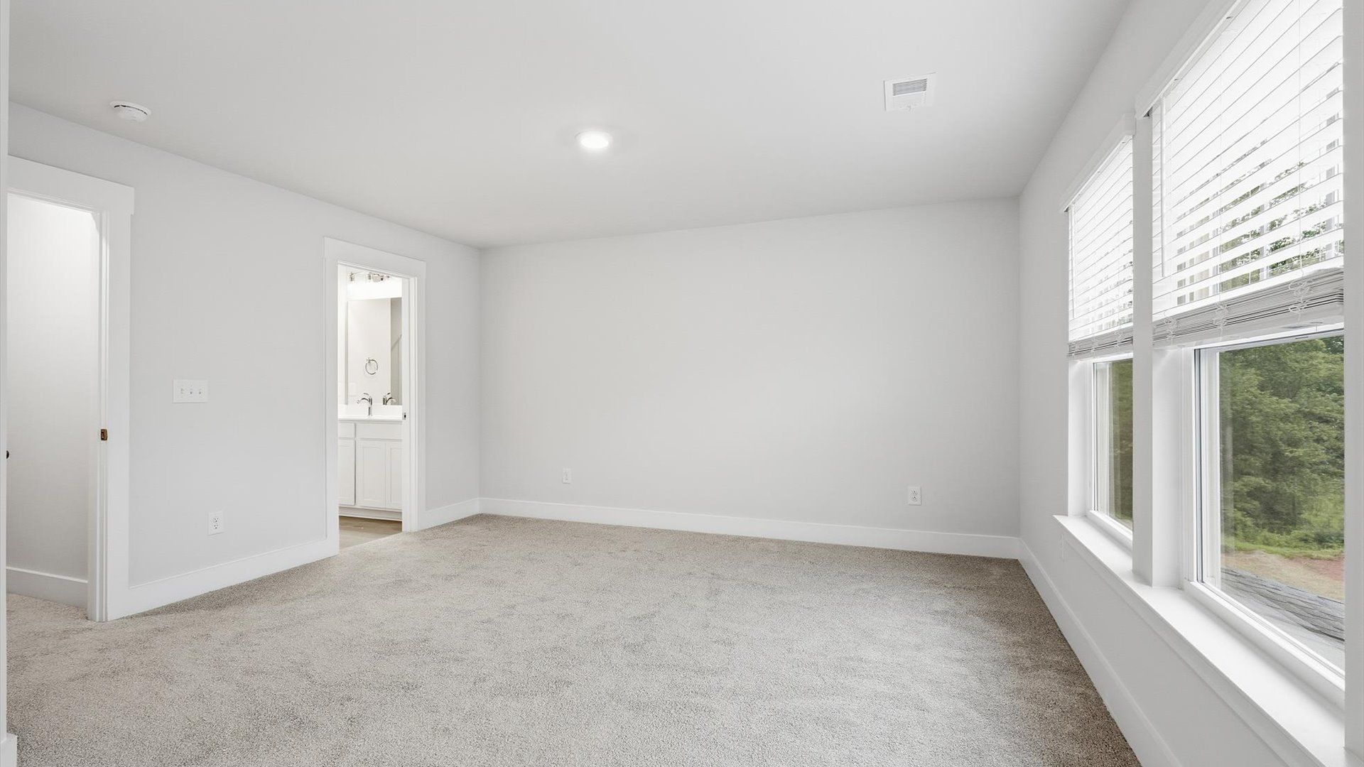 Accomplished design meets restful elegance in this exclusive primary suite by DRB Homes